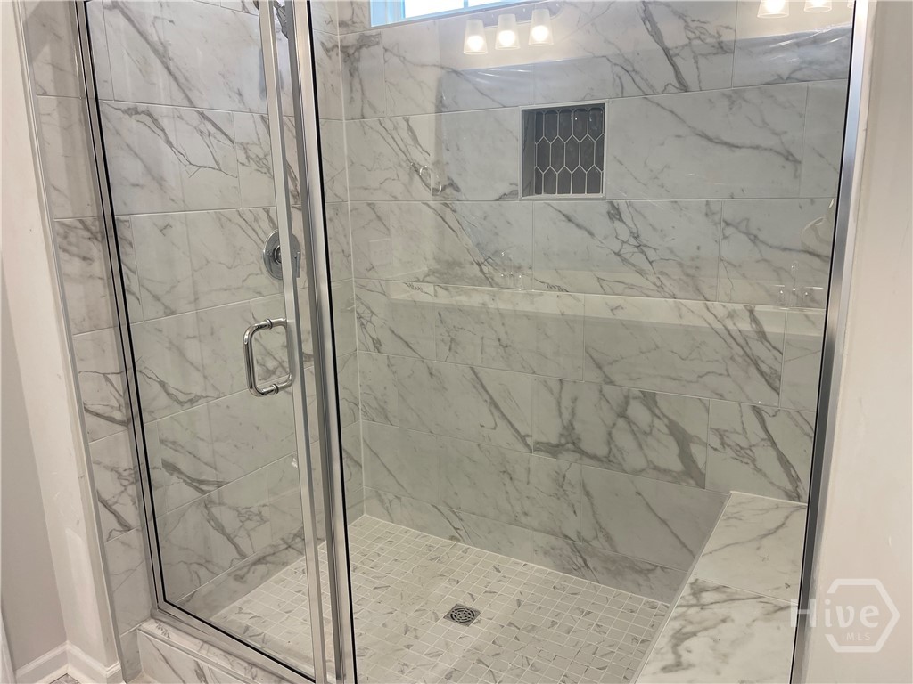 Tiled 6' ft Shower w/bench in Primary