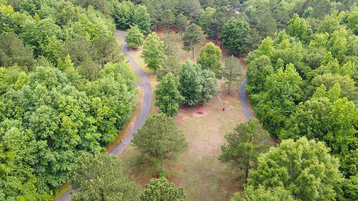 Get active on the Euchee Creek Greenway with access right inside The Estates at Deer Hollow