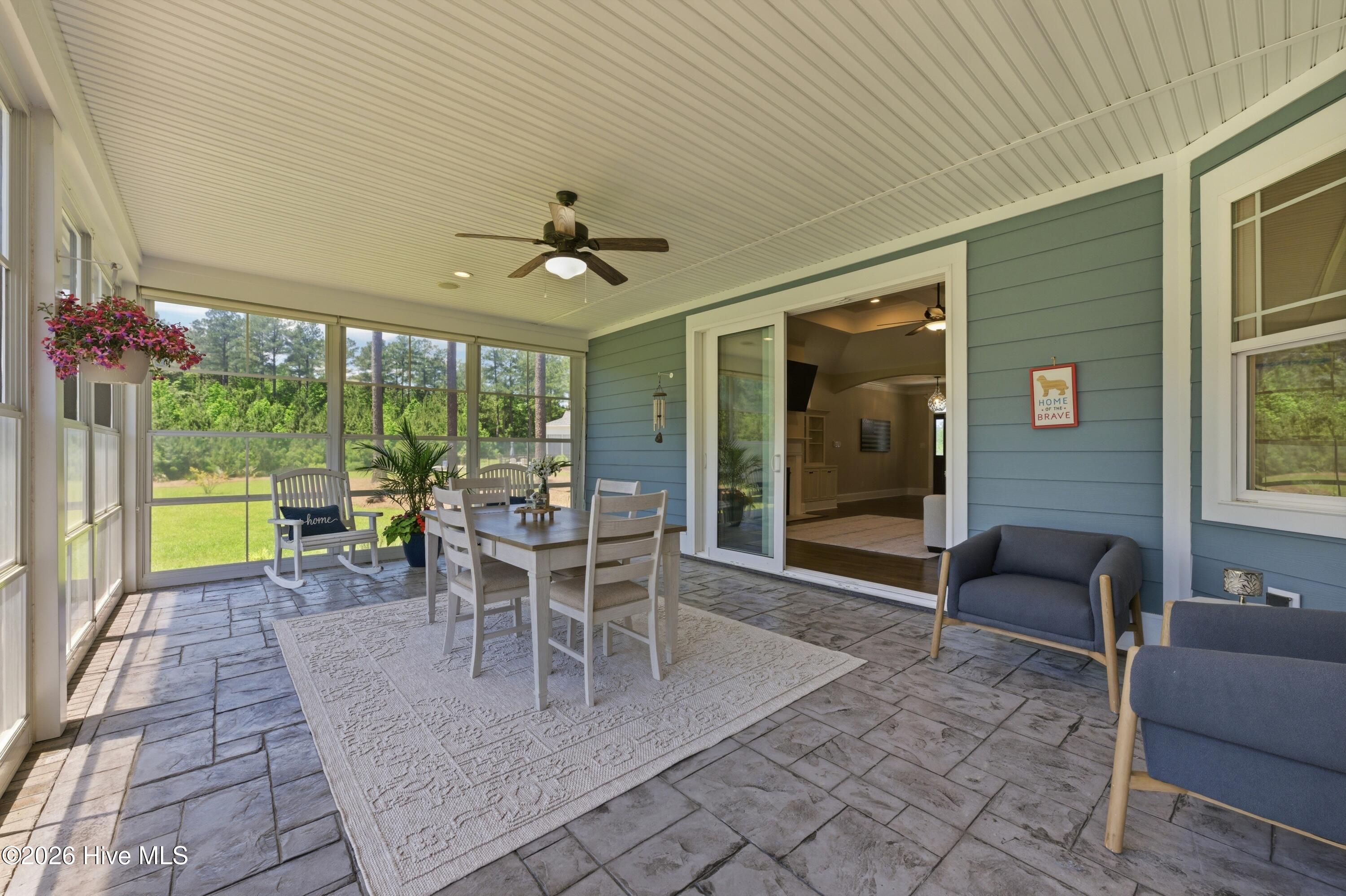 screened in porch off dining room and living room