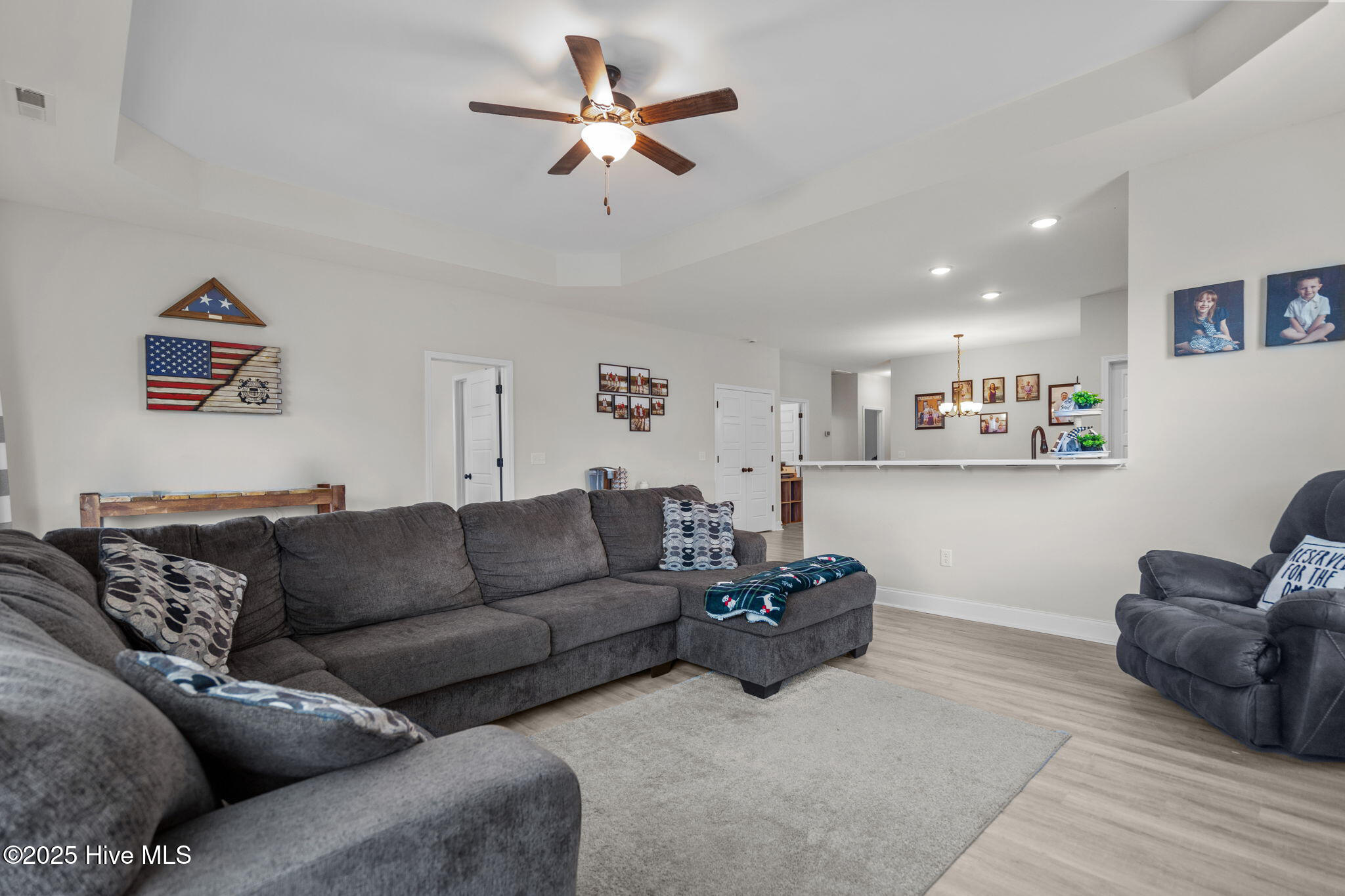 3990 Eclipse Avenue, Leland, NC 28451 – photo 11: 10-living_to_kitchen_from_window