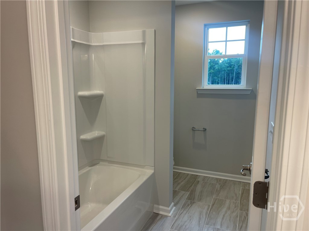 Secondary Bath with Separate Tub and Toilet