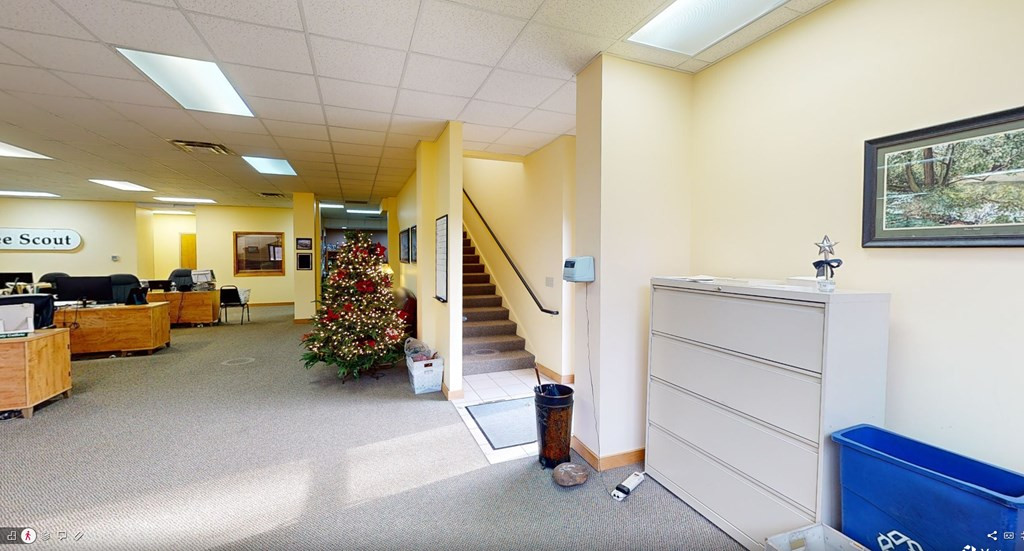gournd level open office area showing stairs leadi