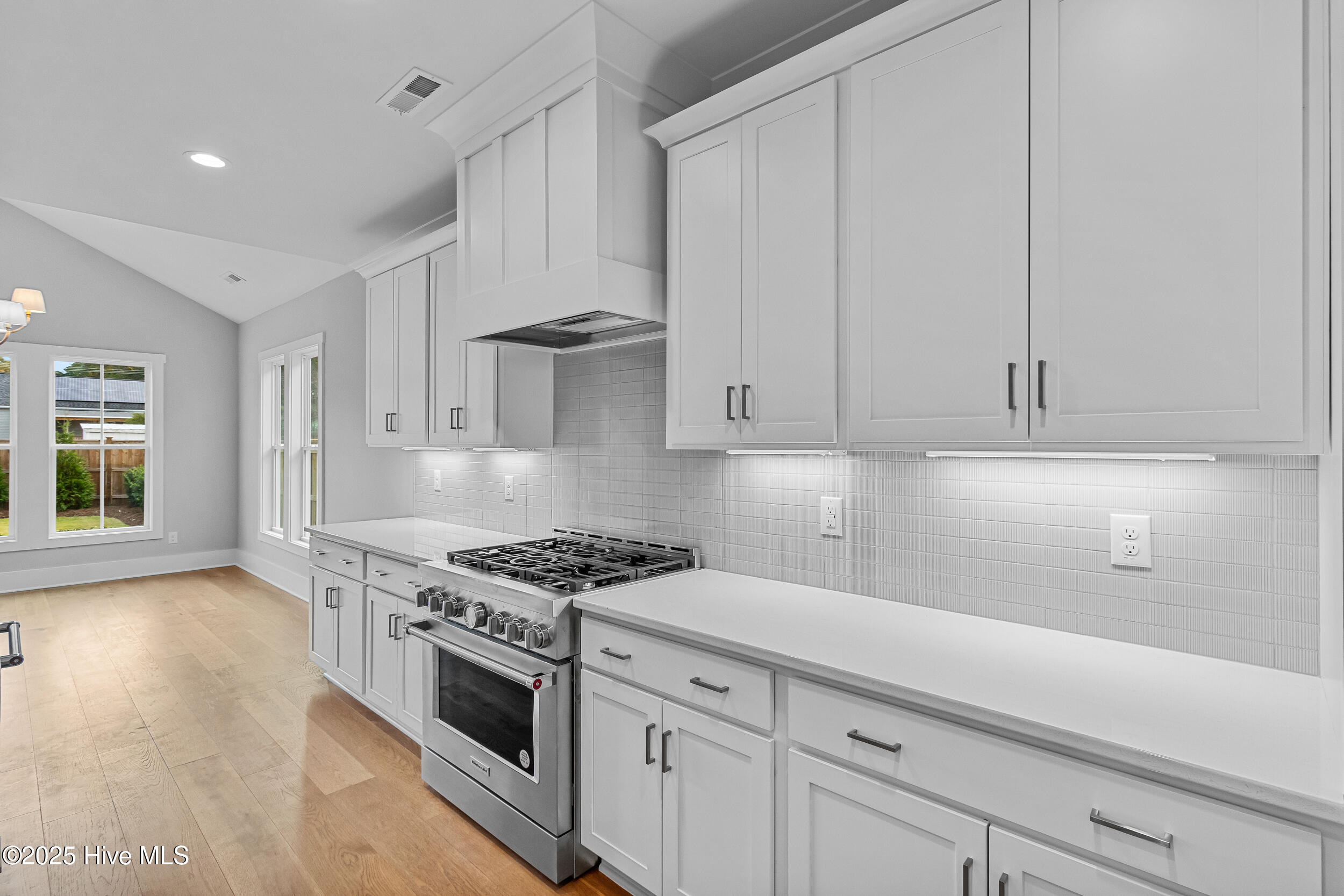 Kitchen with quartz countertops and stainless steel appliances