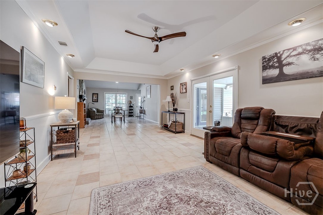 This space would be ideal for a L shaped couch and entertainment center!
