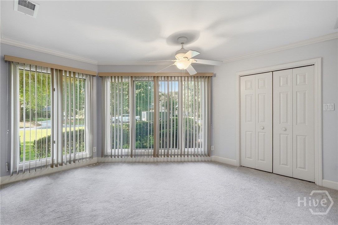 Another guest bedroom with generous closet and plenty of windows!
