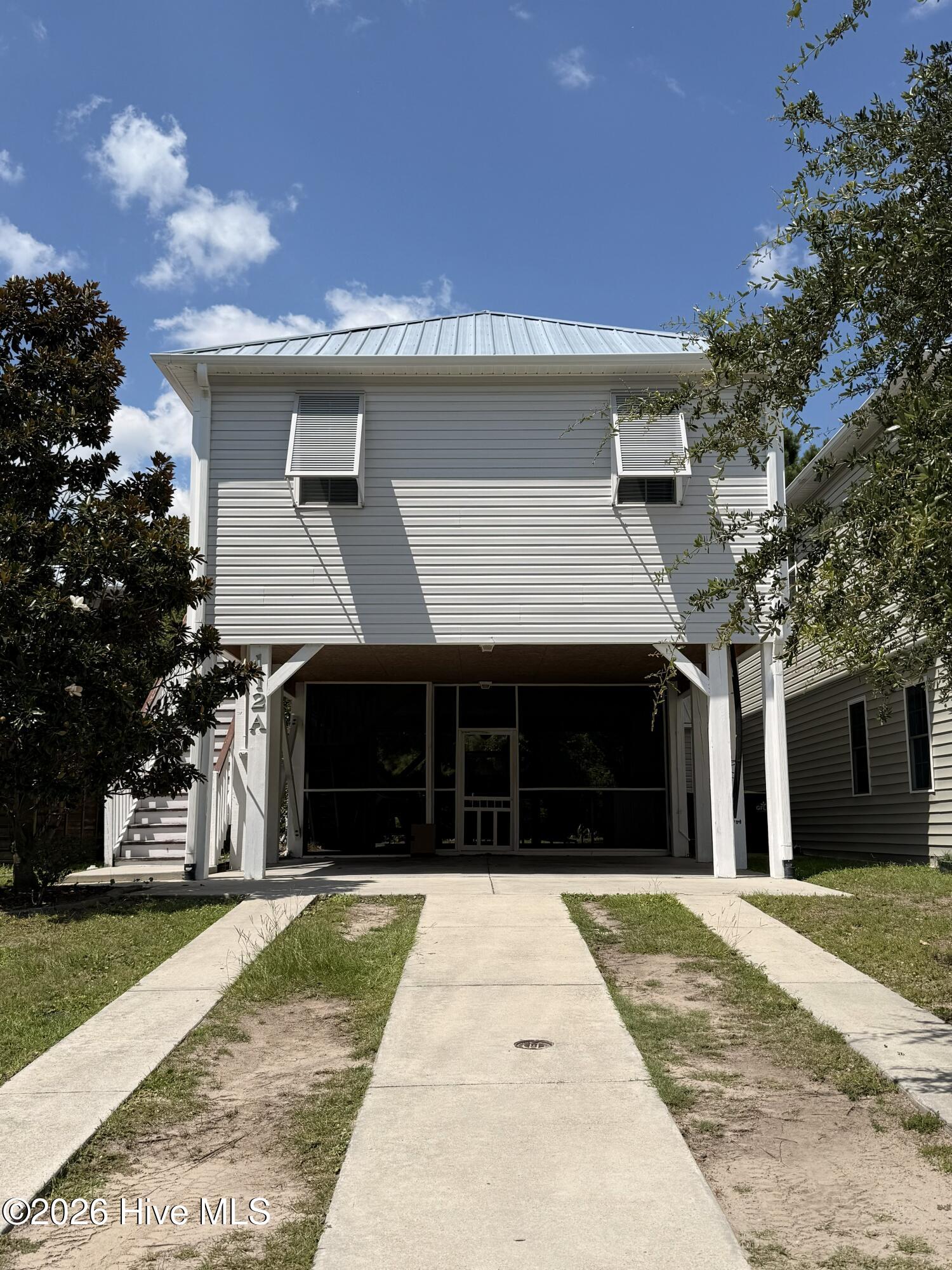 Exterior photo of 112a James Avenue, Holly Ridge, NC 28445. MLS: 100593345