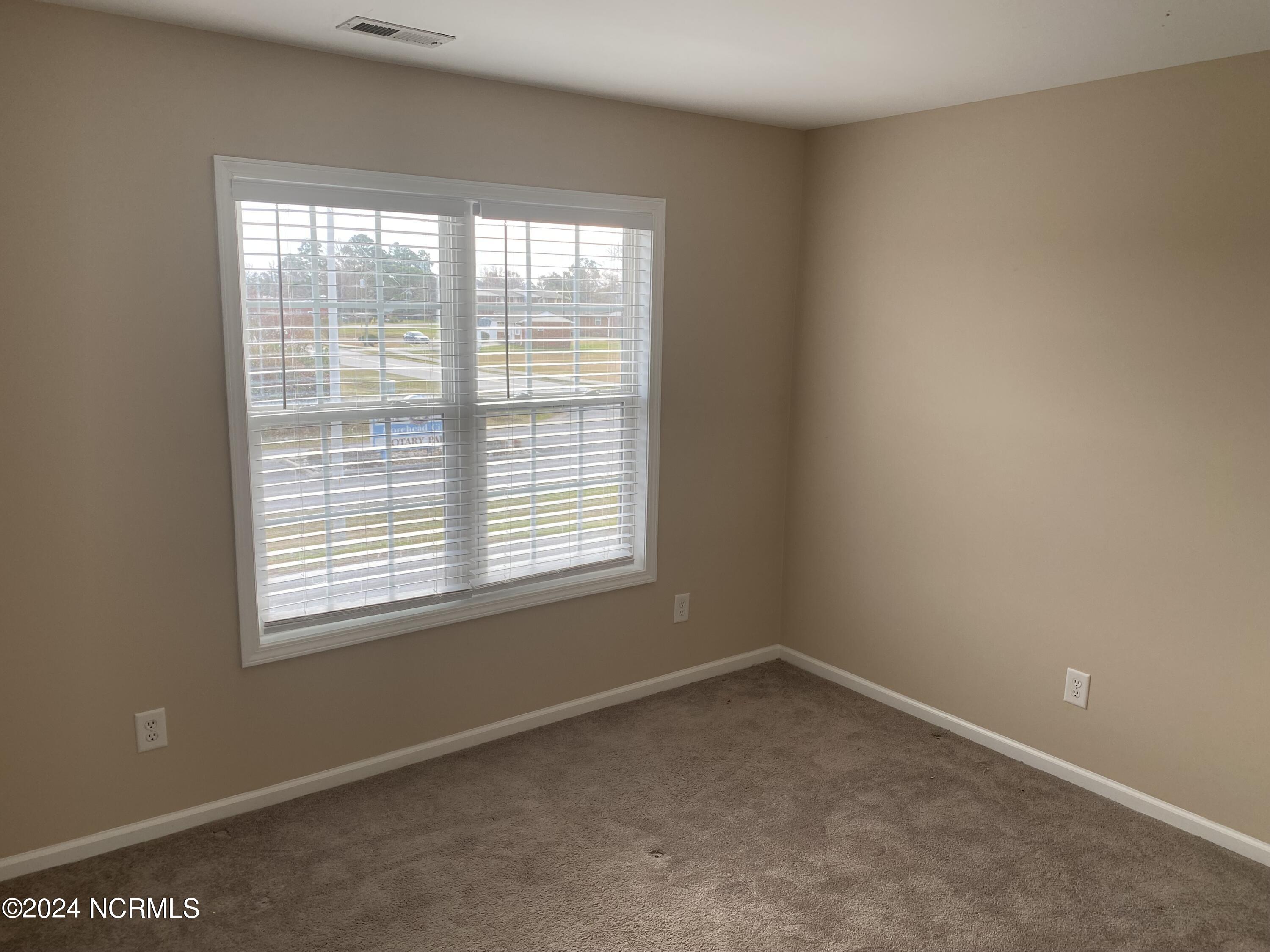 Exterior photo of 2202 Mayberry Loop Road 102, Morehead City, NC 28557. MLS: 100588414