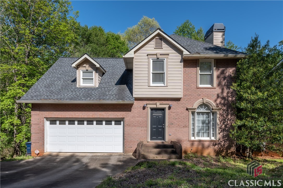 Perhaps the best housing value inside the Loop, this ‘furnished’ 2868’ 2-story home, includes a full basement apartment which has its own kitchen, large open floor plan, private screen porch overlooking woods and a creek, it’s own washer/dryer, private entrances, and can connects to upper 2 stories if desired. The main level has an open floor plan which includes: a living room with wood or gas burning fireplace, the LR flows into a dining room that has double French doors opening to a 2nd story deck and screen porch, and the dining room opens to a large kitchen with 20’ ceilings, granite counters, tile backsplash, an island, abundant storage & counter space, tile floors. The rest of the flooring on the main level, and in upstairs bedrooms, office, and hallway are oak. Upstairs, there are 3 bedrooms ( one a huge master, large enough to include a sitting/lounging area, and has trey ceilings ), an office, and 2 baths. Each of the 3 levels has its own heating/air system. There’s a smart home Nest thermostat, wifi lighting, the 2 car garage includes a Tesla electric charger, easily converted for other EVs. This property is only minutes from Bishop Park, the 58 acre UGA Health Science/Medical school campus, Normaltown, Downtown, UGA.s main campus, 2 hospitals, an array of nice restaurants and entertainment venues, as well as access to the Loop. There is a neighborhood pool one can join by membership, though there are no mandatory HOA dues. This is a unique property by virtue of having a secondary living space, ideal for extended family, friends, or Airb&b use. It sits on a quiet cul-de-sac, and backs up to beautiful lush woods and a creek, and deer, owls, possibly  bigfoots, and all manner of wildlife can be seen meandering along the creek. Additionally, it’s nicely furnished, and move-in ready. At this price, it’s unlikely to be available for long.3-D TOUR HERE: https://my.matterport.com/show/?m=xtoCHp28E7x&mls=1