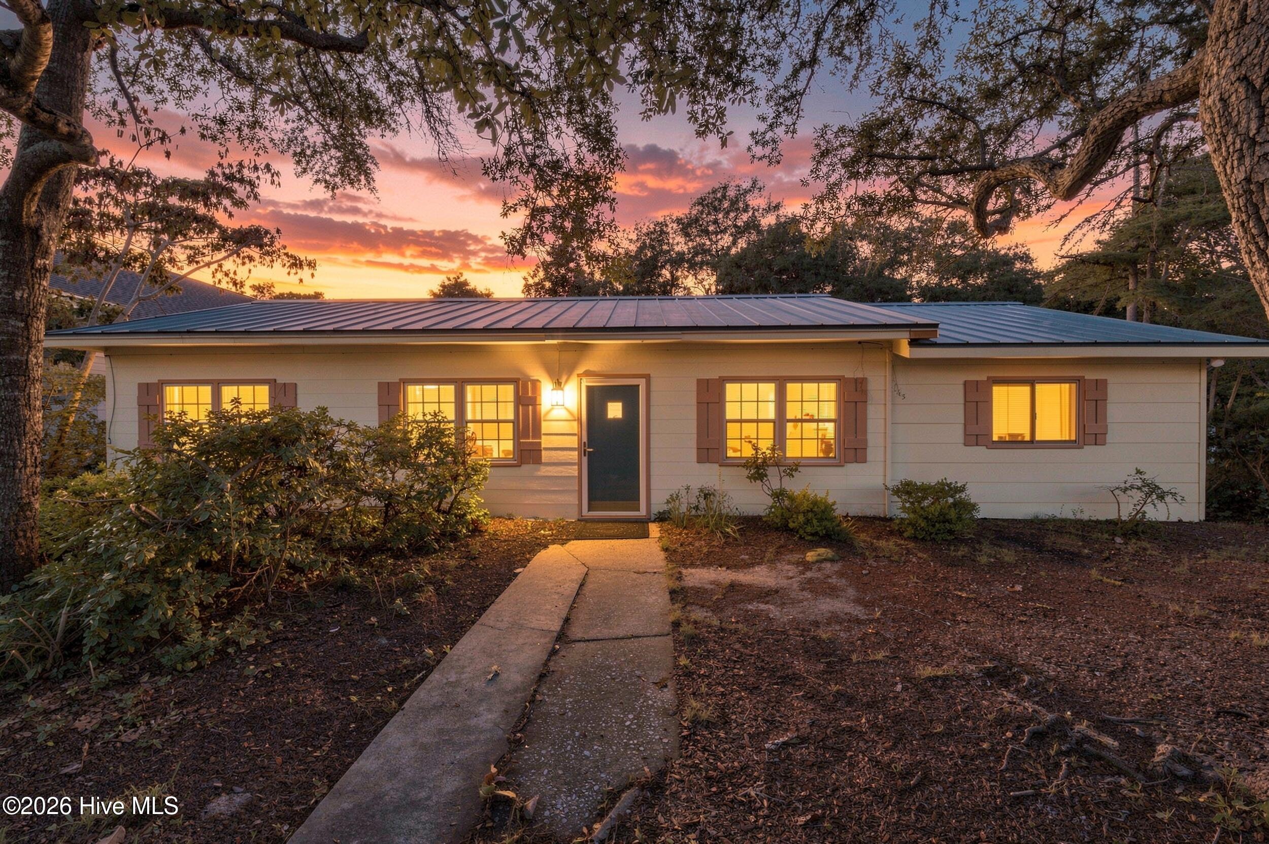 Photo 2 of Single family home for sale at 143 Northwest 7th St, Oak Island, NC 28465 | MLS# 100601733 | Listing updated on 2026-10-05