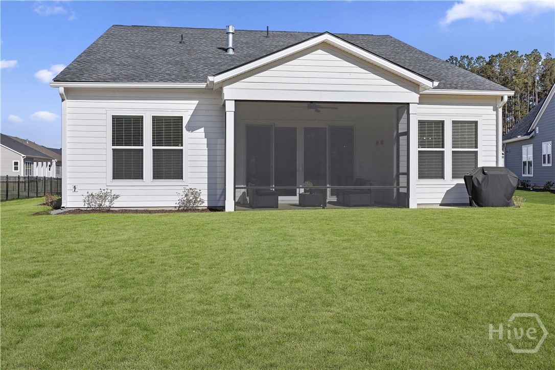 The screened porch and extended patio provide a comfortable outdoor space to enjoy morning coffee or unwind in the evening while overlooking the lagoon