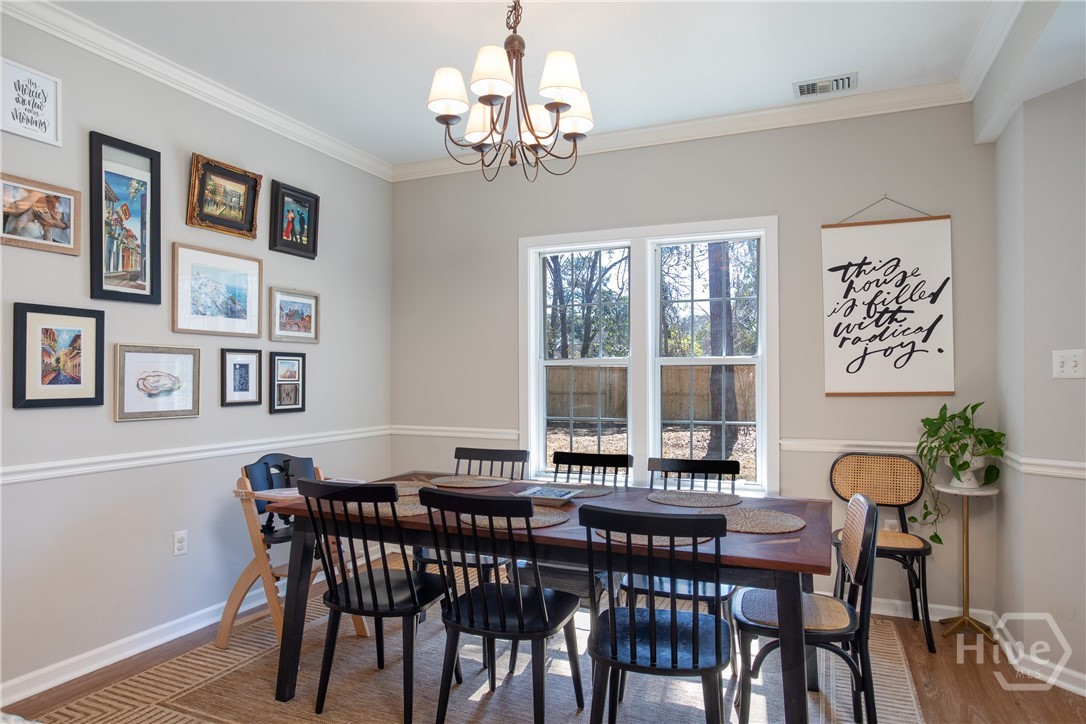 Dining /breakfast room overlooking flowers & backlawn
