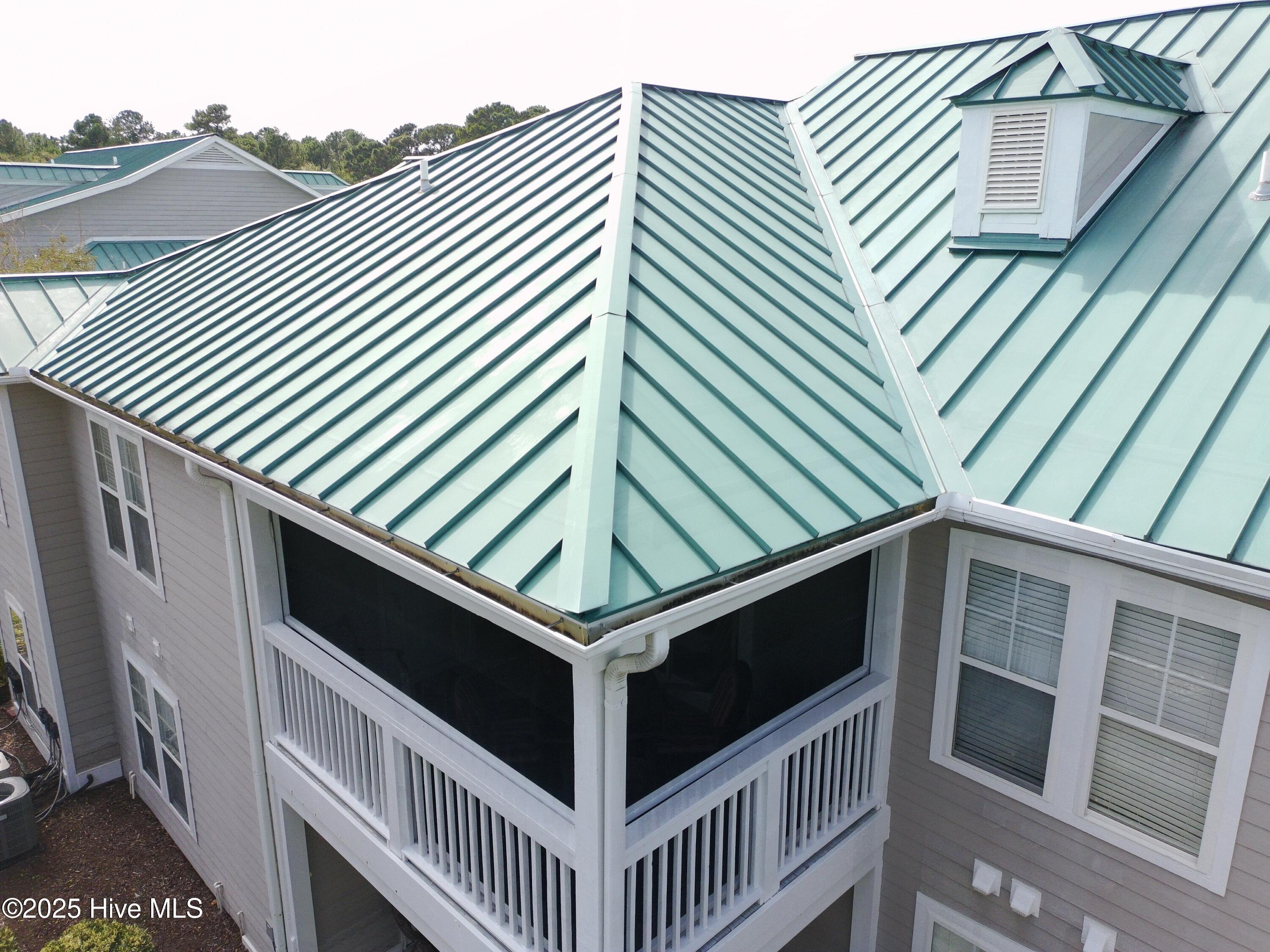 1620 Goley Hewett Road SE Unit 307, Bolivia, NC 28422 – photo 15: Back porch condo
