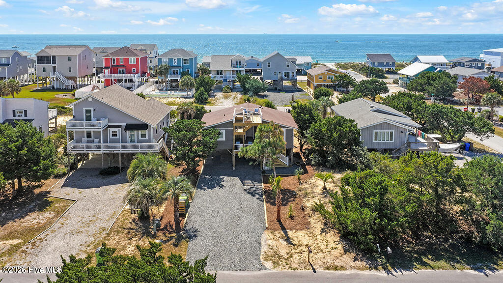 Photo 2 of Single family home for sale at 2021 W Dolphin Dr, Oak Island, NC 28465 | MLS# 100613192 | Listing updated on 2026-10-29