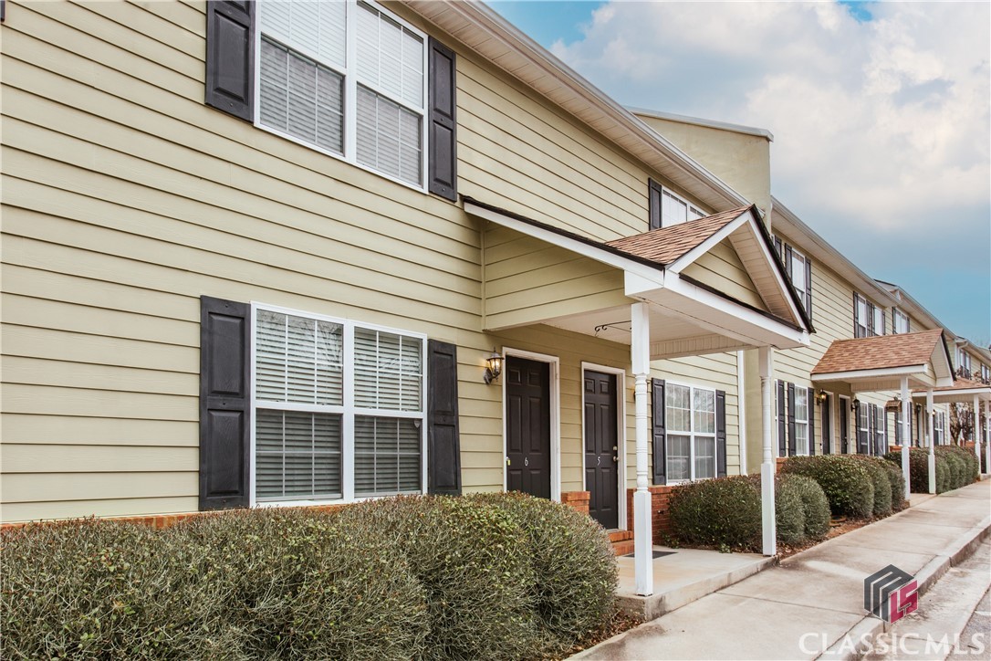 Wonderful renovated and upgraded townhouse in Mallard Creek available! This 2 bedroom, 2.5 bath townhouse could be a great investment or a home for anyone looking for a well-maintained, turn-key and low-maintenance property in a convenient and central location. Downstairs you'll find a great open floor plan with a renovated kitchen that includes stainless appliances, granite countertops and an extra large island that doubles up as dining table, providing seating for 8 (stools stay!) and a ton of extra storage. Upstairs are 2 spacious bedrooms, each with it's own bathroom. Water heater & HVAC system are approx 3 years old. Nice outdoor space right off the kitchen.Located just minutes from the loop, 5 minutes to Normaltown, 10 minutes to Downtown, this move-in ready property is ready to go!