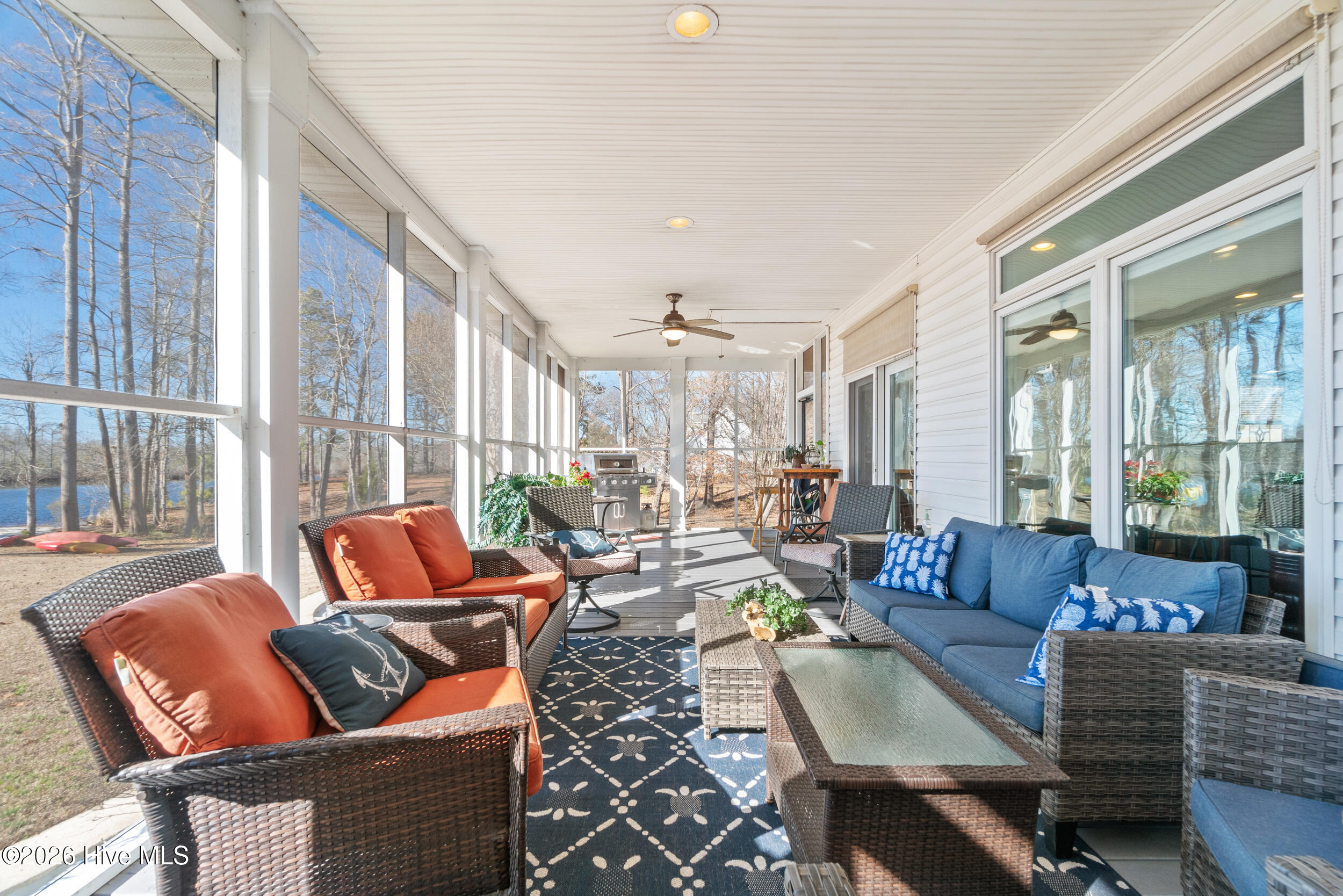 Screened porch, main house, river side