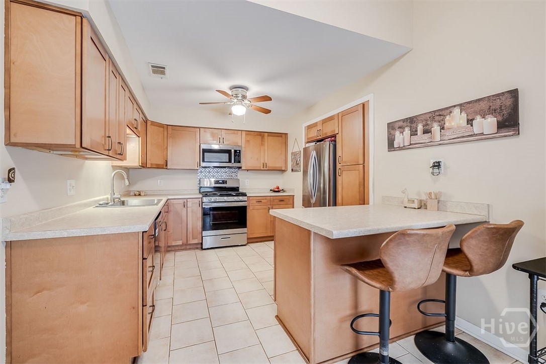 Beautiful wood cabinetry and great working space!