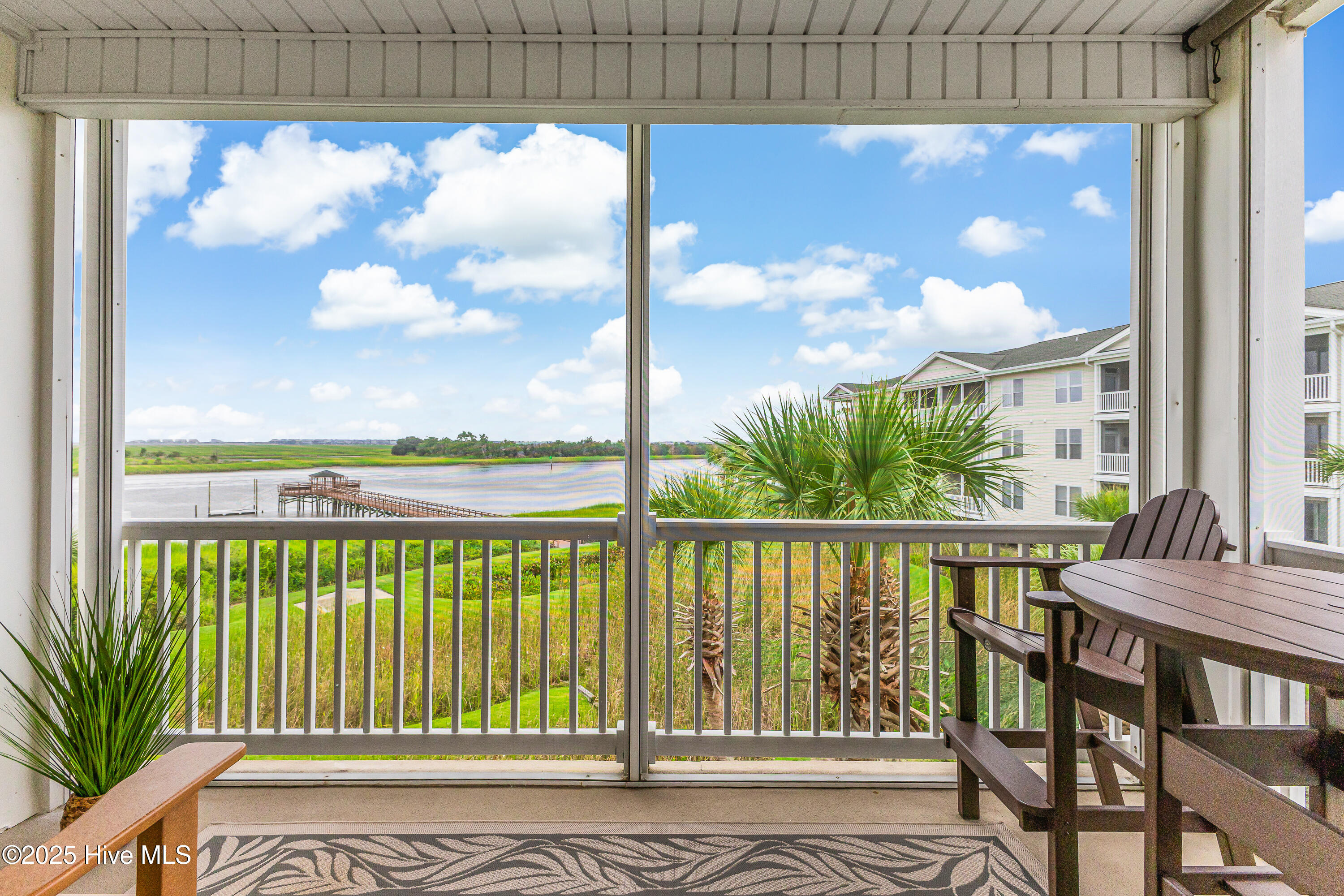 1135 Park Road SW Unit 4201, Sunset Beach, NC 28468 – photo 4: Screeend in porch facing ICW