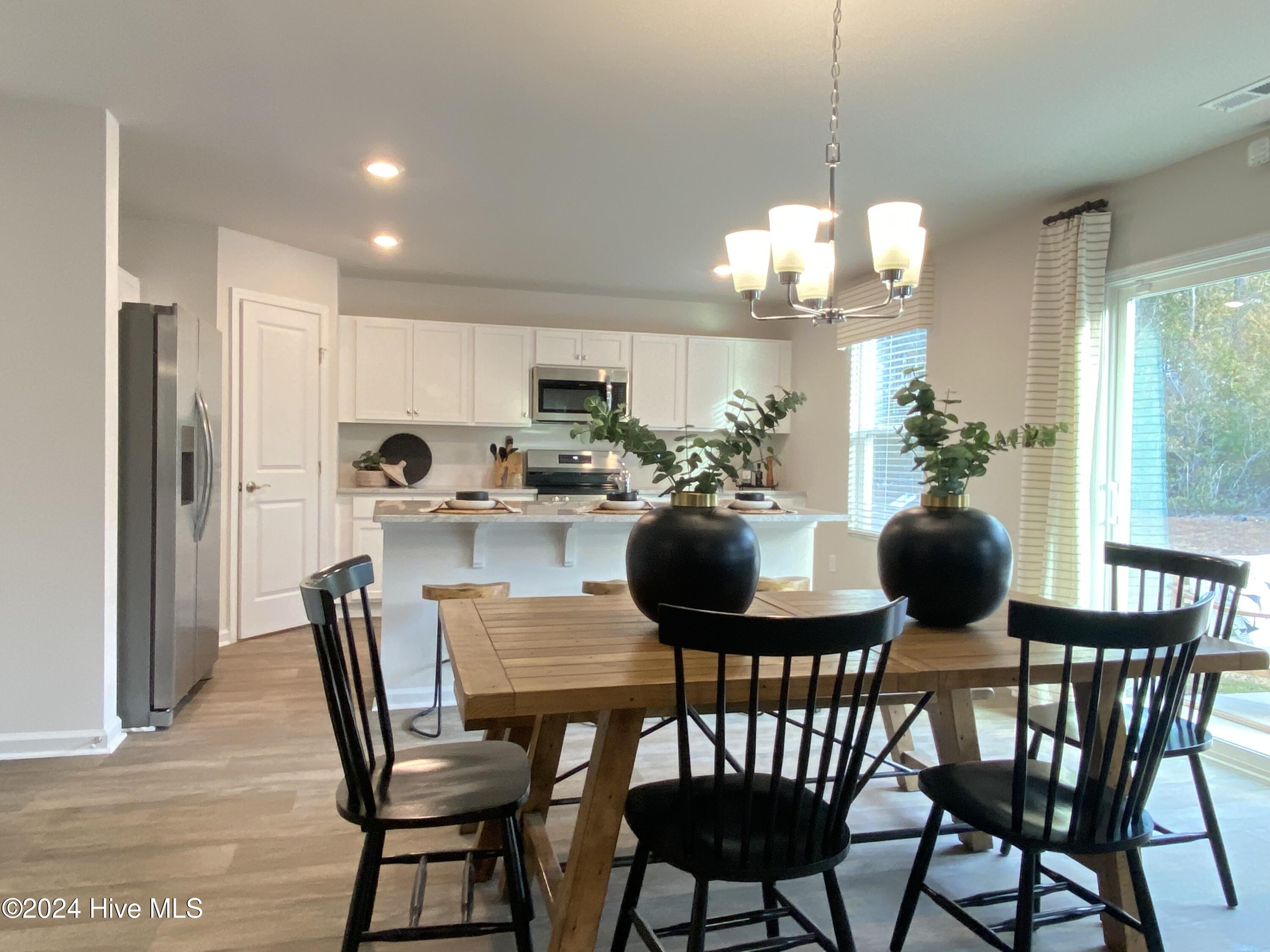 5191 Meagan Lane NE, Winnabow, NC 28479 – photo 5: Kitchen and Casual Dining