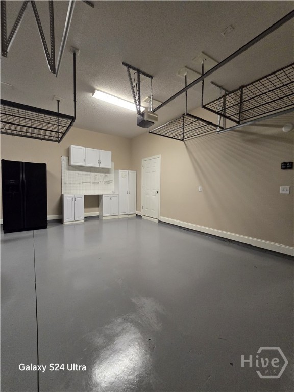 Refrigerator and Work Center. Door to Utility Closet