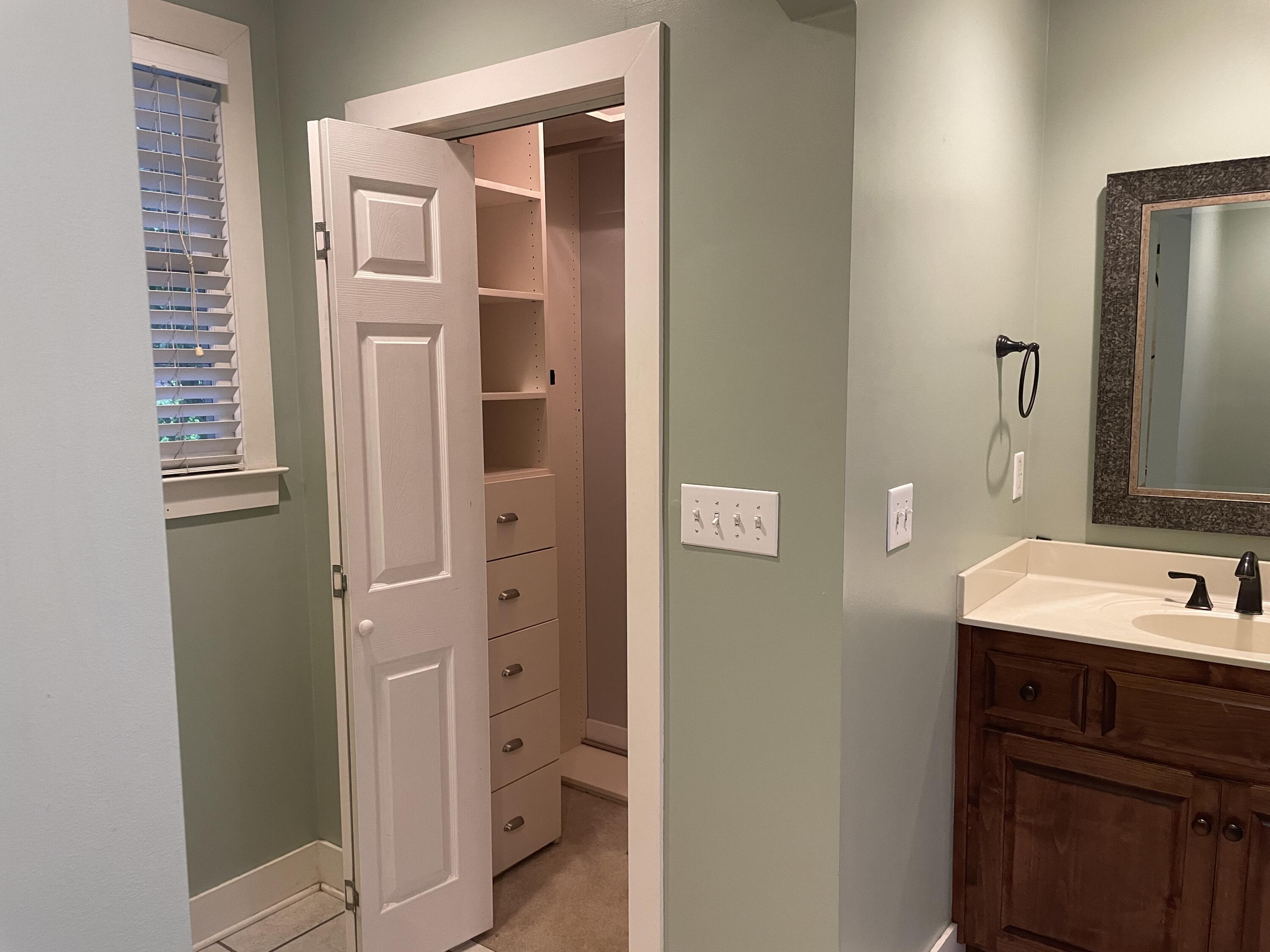 PRIMARY BATHROOM WITH CUSTOM CLOSET