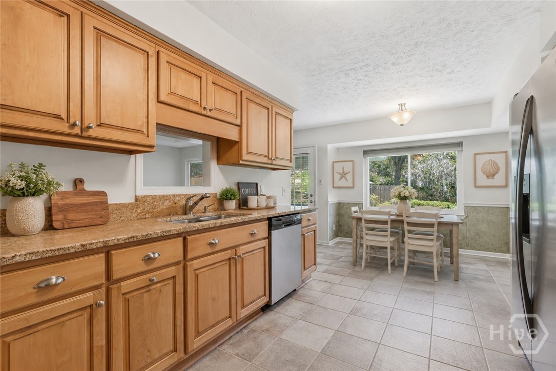 The kitchen has been virtually staged.