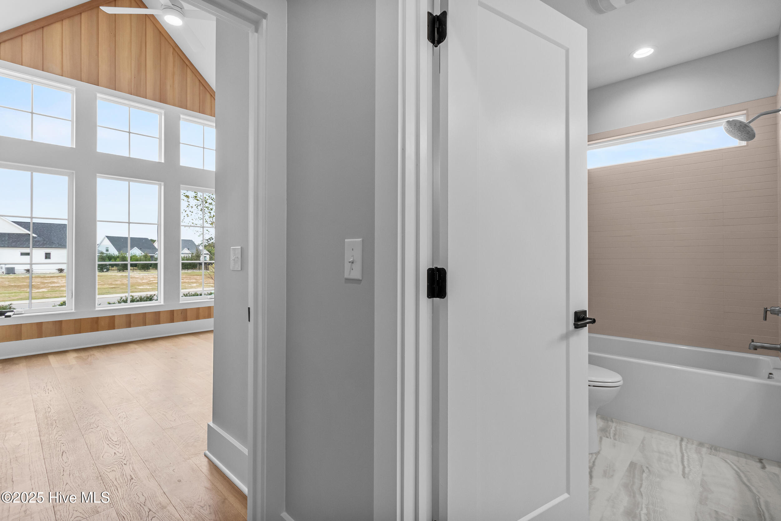 Hallway leading to bathroom and bedroom