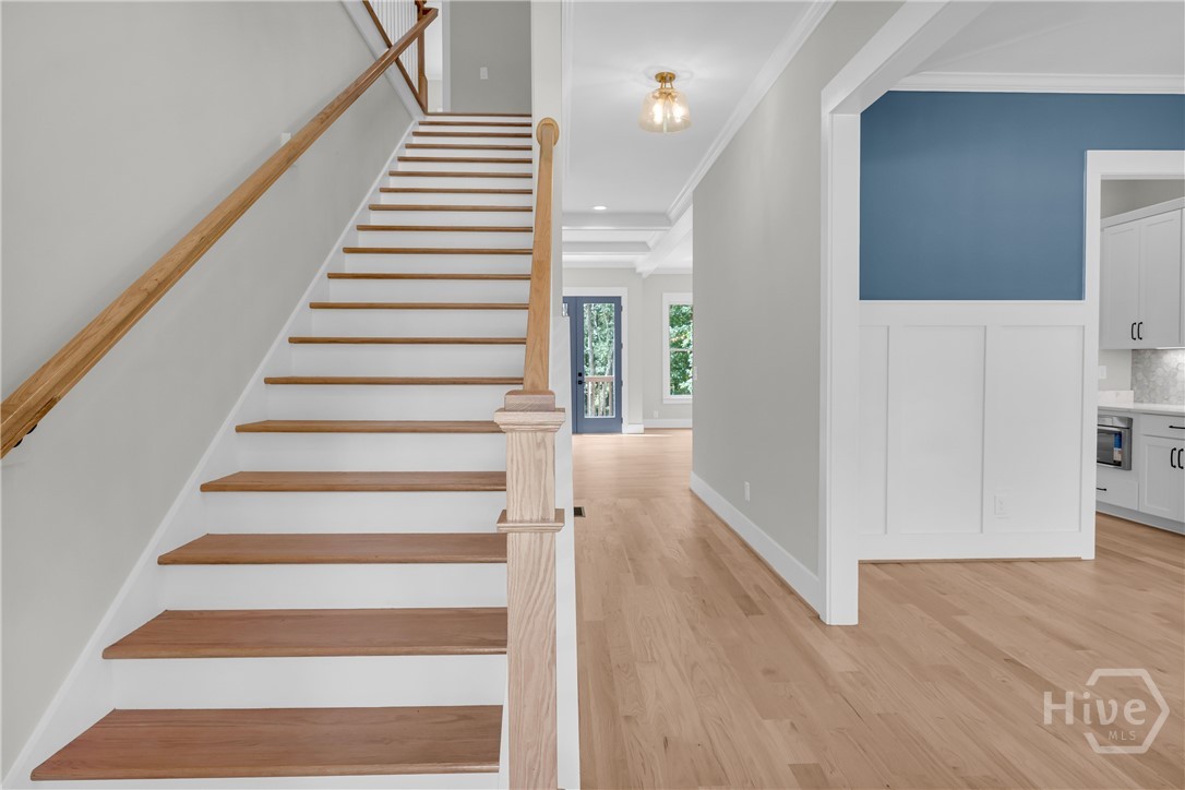 Sand-and-finish hardwood flooring throughout main floor