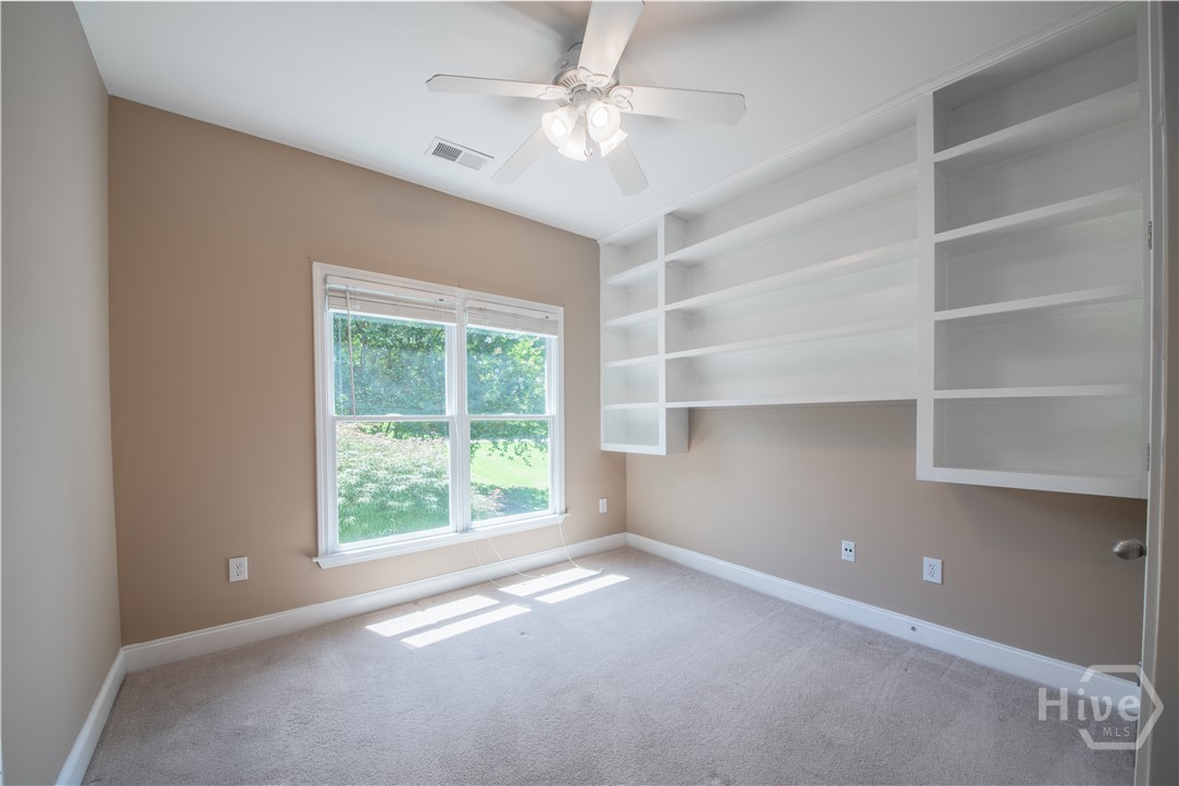 Bedroom 2 with Built-In Shelving