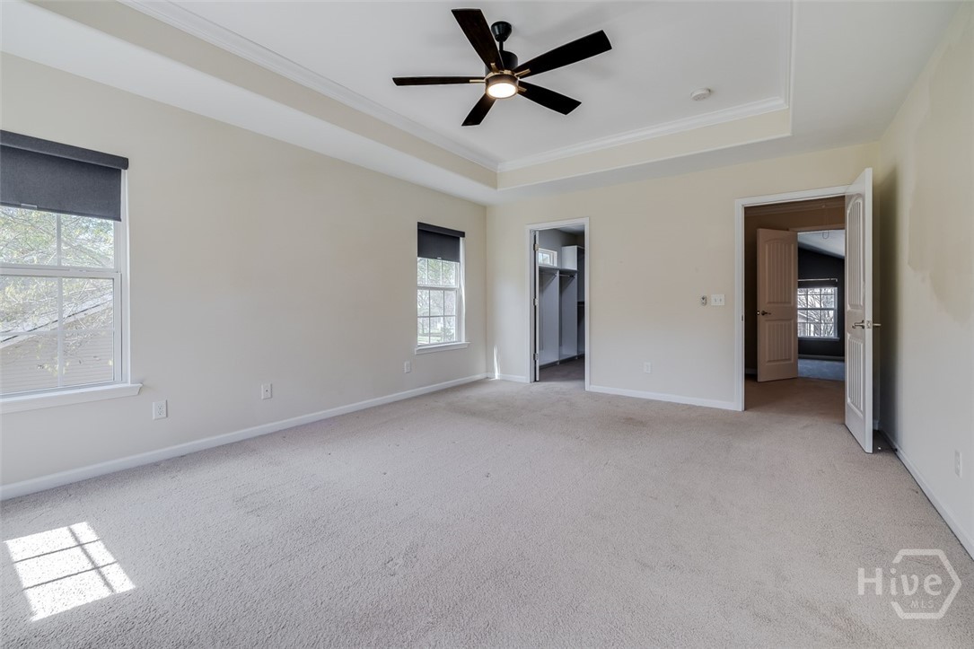 Upstairs primary bedroom with spa like bath and amazing closet.