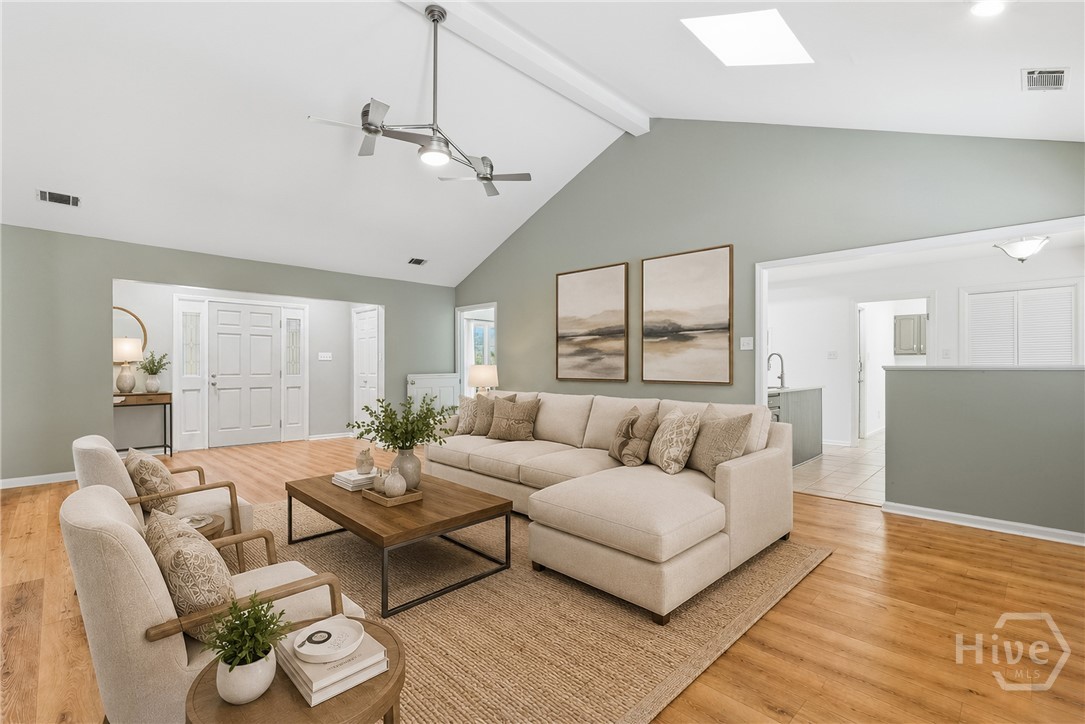 Great room is spacious and light-filled and flows