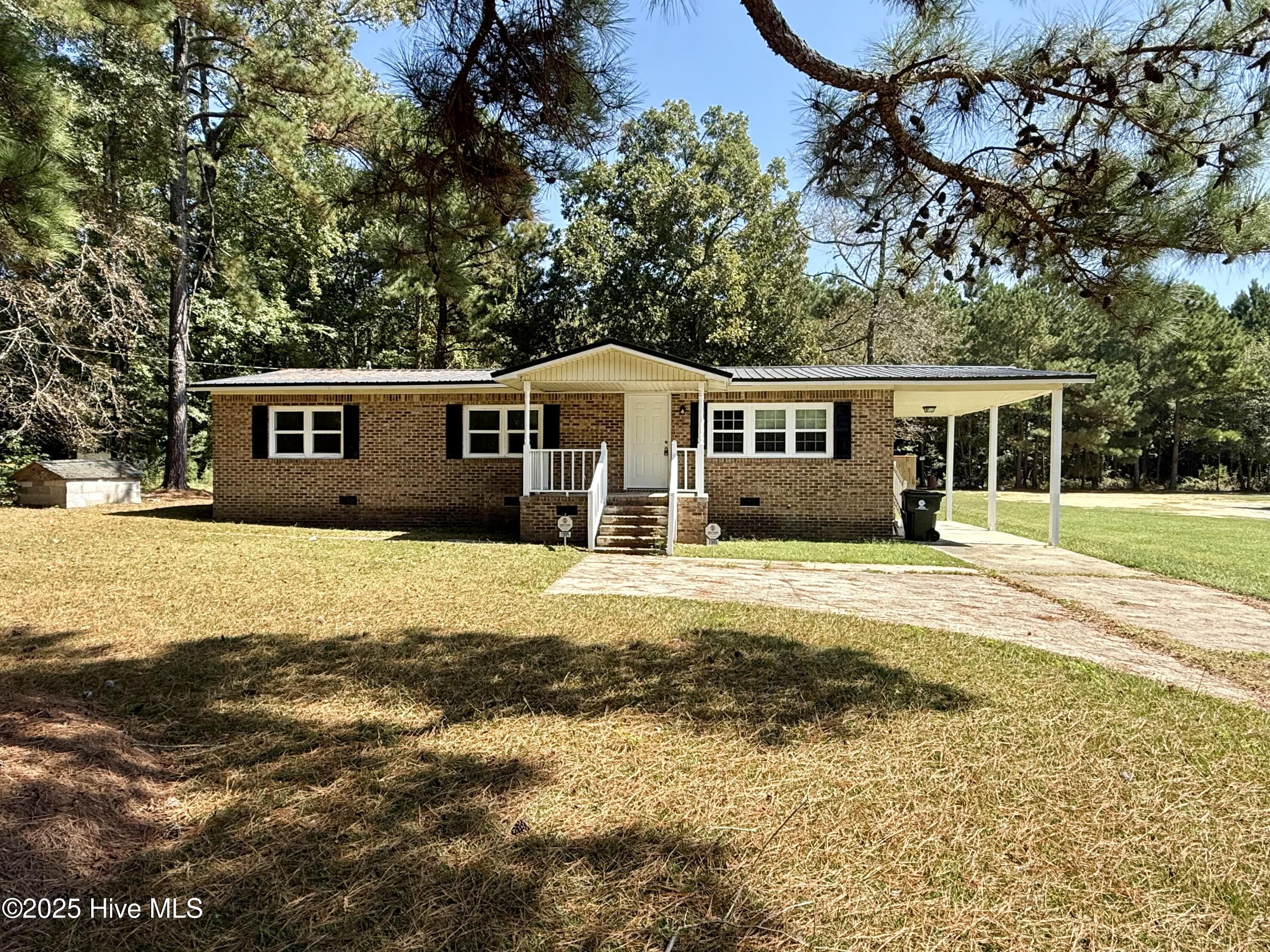 Step into this beautifully remodeled 3-bedroom, 2-bathroom brick double-wide manufactured home, nestled in the peaceful Rodgers Town Community. Conveniently located between Washington, Williamston, and Bear Grass, this charming property offers nearly half an acre of serene countryside living.
As you enter, you'll be welcomed by a cozy living area that flows seamlessly into the dining and kitchen spaces featuring brand-new carpet . The kitchen and dining areas boast stylish updates, including new luxury vinyl tile flooring, modern countertops, fresh cabinetry, and brand-new appliances. 
Two of the bedrooms feature new carpet and share an updated hallway bathroom, while the third bedroom offers the luxury of a private, renovated en-suite bathroom. 
With the convenience of a private septic system and county public water, this home combines practicality with the tranquility of rural living. Perfect for those seeking comfort, affordability, and the charm of the countryside. Don't wait—schedule your visit today and discover your dream rural retreat!