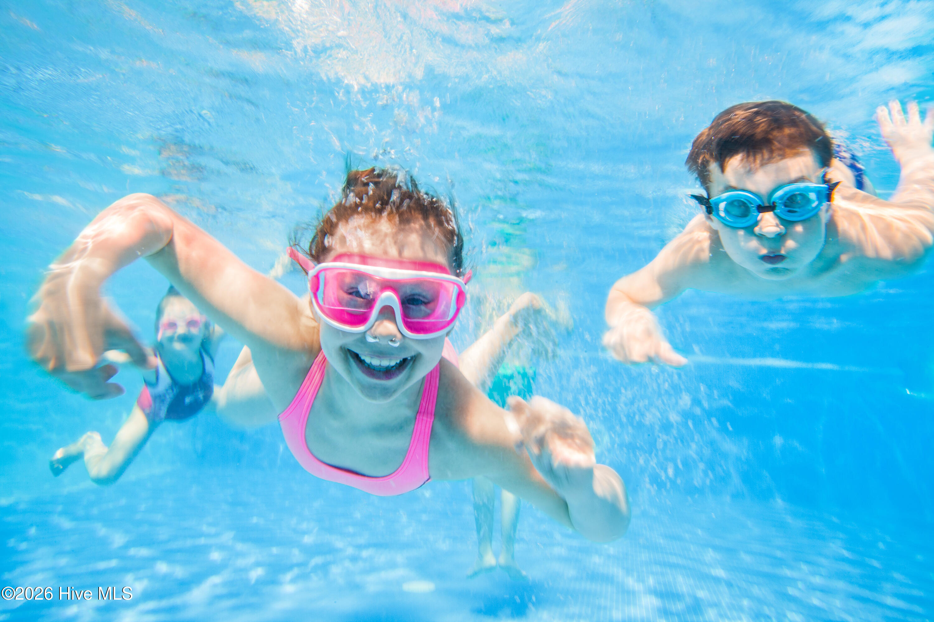 3 White Kids Under Water in Pool