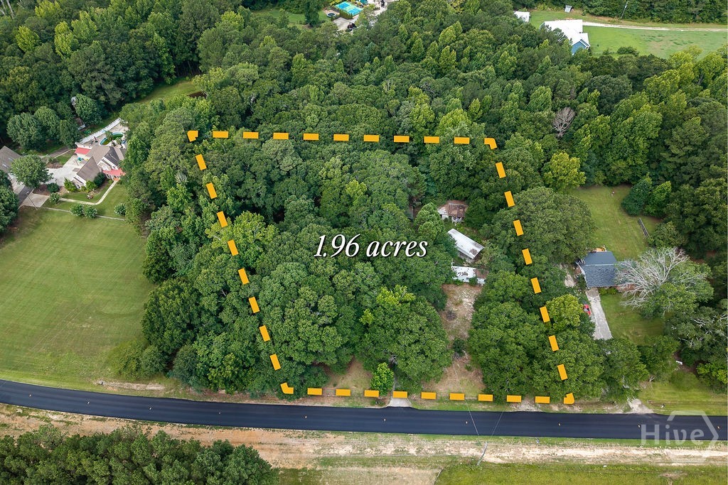 Set on 1.96 acres in Oconee County, this property is best suited for an investor, builder, or buyer looking for a project rather than a move-in ready home. The parcel is on well water, and public records also reflect an existing septic system. This property is being sold in as-is condition.There are two mobile homes on the property. One is in very poor condition and should be treated as a tear-down. The other has been occupied more recently, but it will likely need significant rehab or removal depending on the buyer’s plans.Recent soil testing has been completed to explore options for a new septic system if needed. Per Oconee County and current Georgia law, a buyer may be able to remove the existing mobile home and replace it with another manufactured home, subject to permits and county approval. Buyers should confirm all plans directly with Oconee County. Oconee County has also referenced updates to its Unified Development Code to align with state law regarding replacement manufactured homes.For a buyer who wants a different long-term path, the property may also work as a site to clear and build a stick-built home, again subject to the usual county review, soil, septic, and permitting requirements. This is an opportunity for someone who is comfortable improving or redeveloping a nearly two-acre tract in Oconee County.