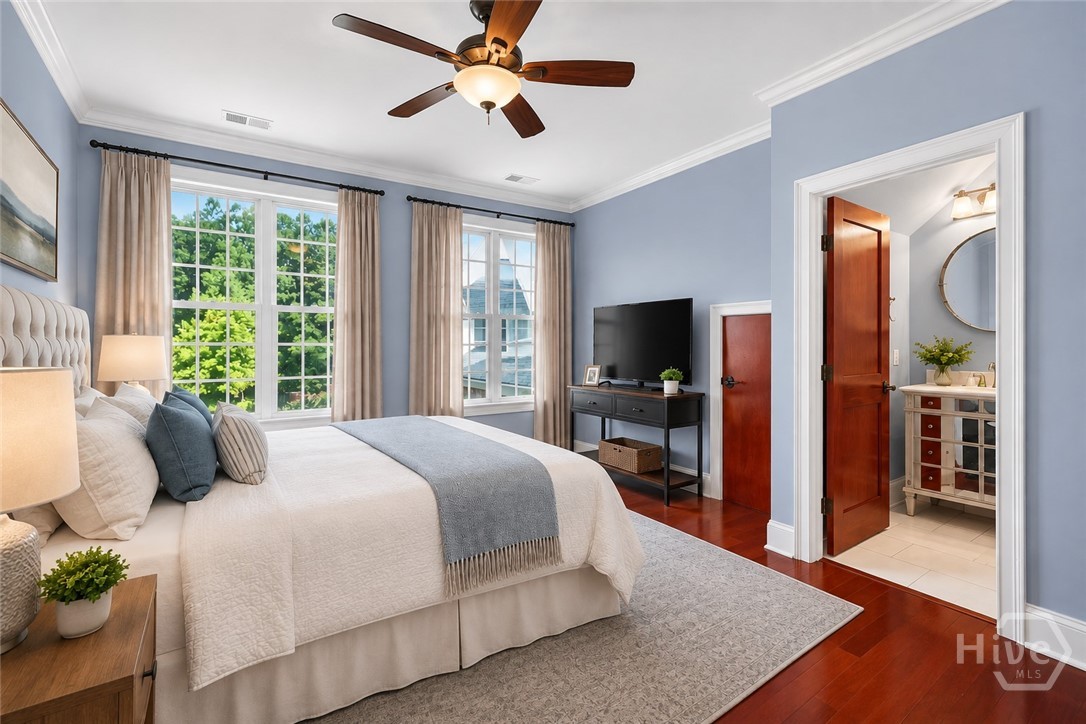 2nd floor bedroom w/ ensuite bath, virtually staged looking to ensuite bath