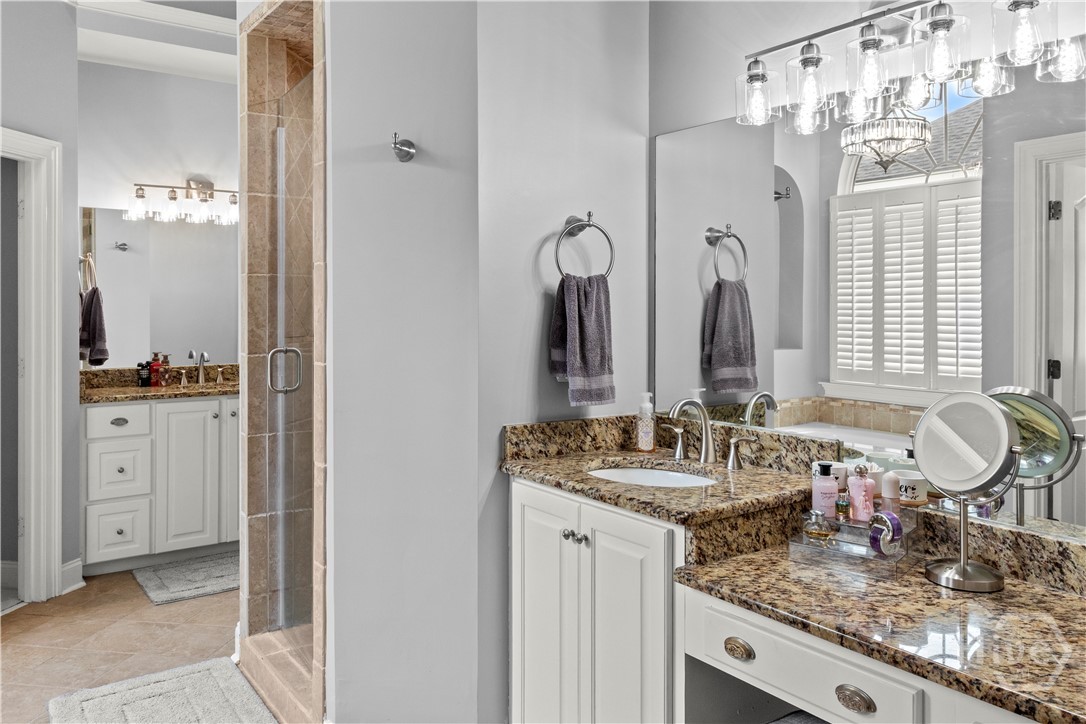 Primary bathroom with all updated lighting fixtures