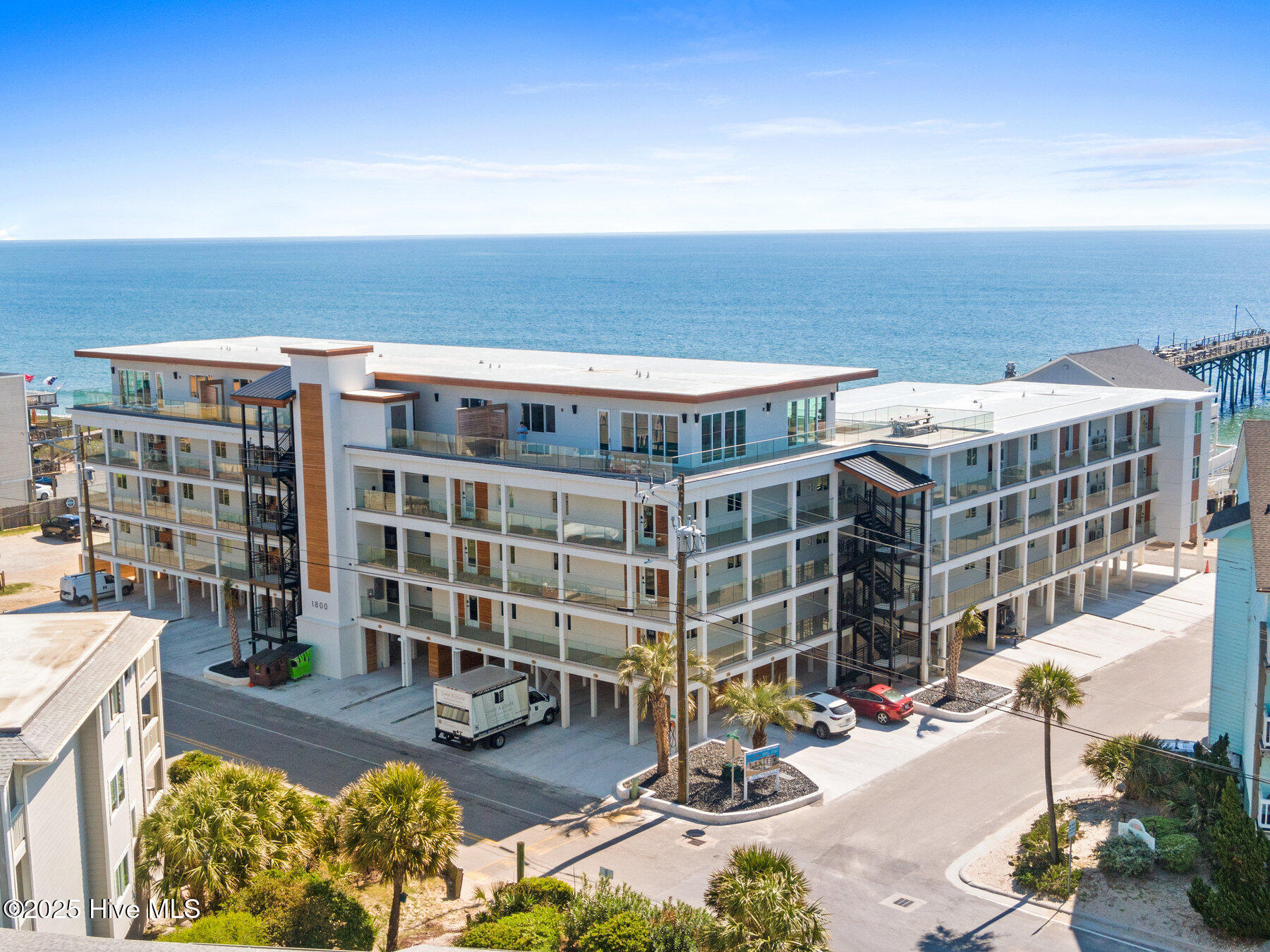 1800 Canal Drive 107, Carolina Beach, NC 28428 – photo 2: 327_1800_canal_dr_exterior-2_261