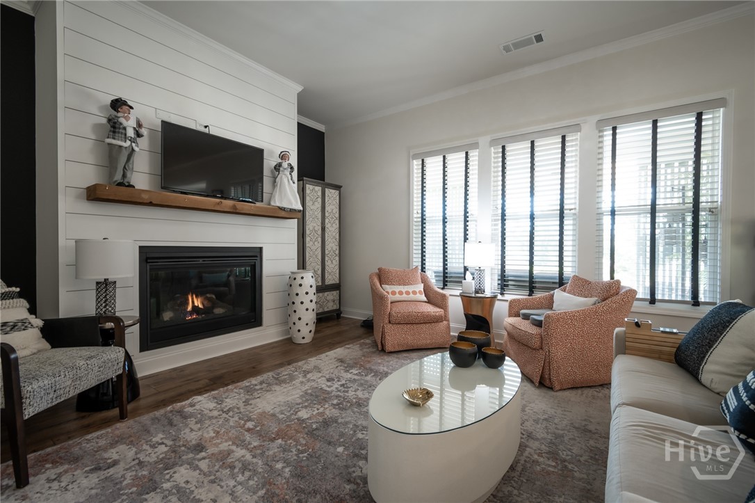 great room with gas fireplace
