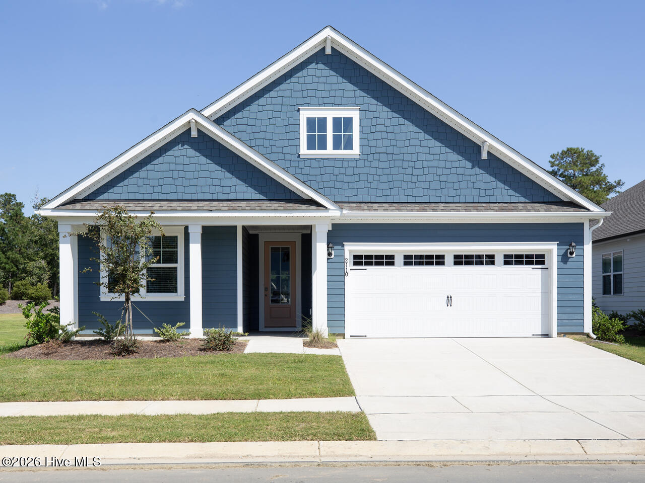 Photo is of a completed, similar home. Actual colors may vary