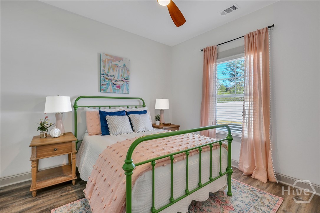 PHOTOS OF A PREVIOUSLY BUILT BRINSON PLAN BY LAWRENCE ALEXANDER HOMES.