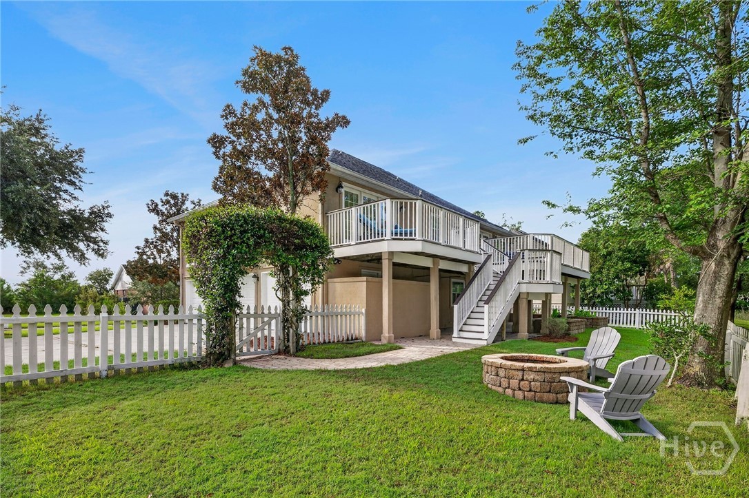 Fire pit within fenced in backyard