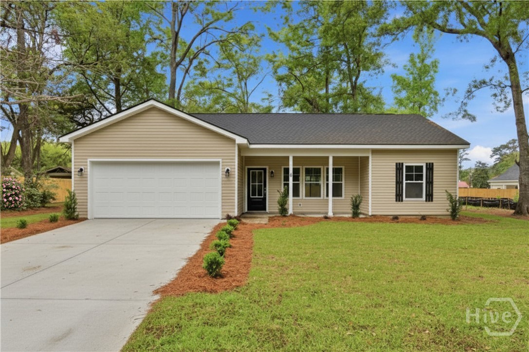 Custom Builder • Construction Complete • No HOA Brand new construction without the wait! 3-bedroom, 2-bath home located in the Kamryn's Park community in the heart of Yemassee, SC. The spacious living area flows seamlessly into the dining space, where sliding glass doors frame backyard views and bring in natural light. The kitchen features quartz countertops, soft-close cabinets, and modern finishes, while luxury vinyl plank flooring runs throughout the home for a clean, cohesive look. Additional highlights include a dedicated laundry room with storage cabinets and an attached 2-car garage. Conveniently located with easy access to Savannah, Beaufort, Beaufort Air Station, Bluffton, Hilton Head, and Charleston, this home combines the appeal of brand-new construction with the charm of a Lowcountry setting.