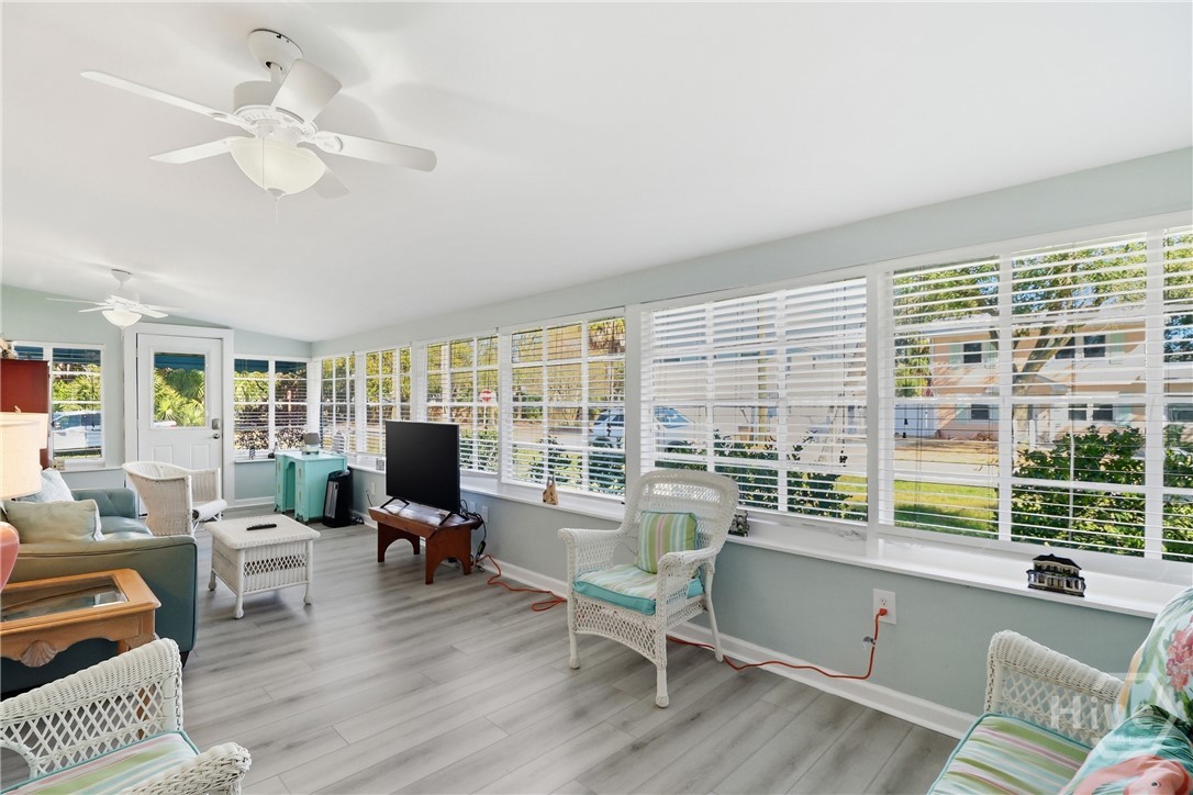 OPEN & BRIGHT SUNLIT PORCH.