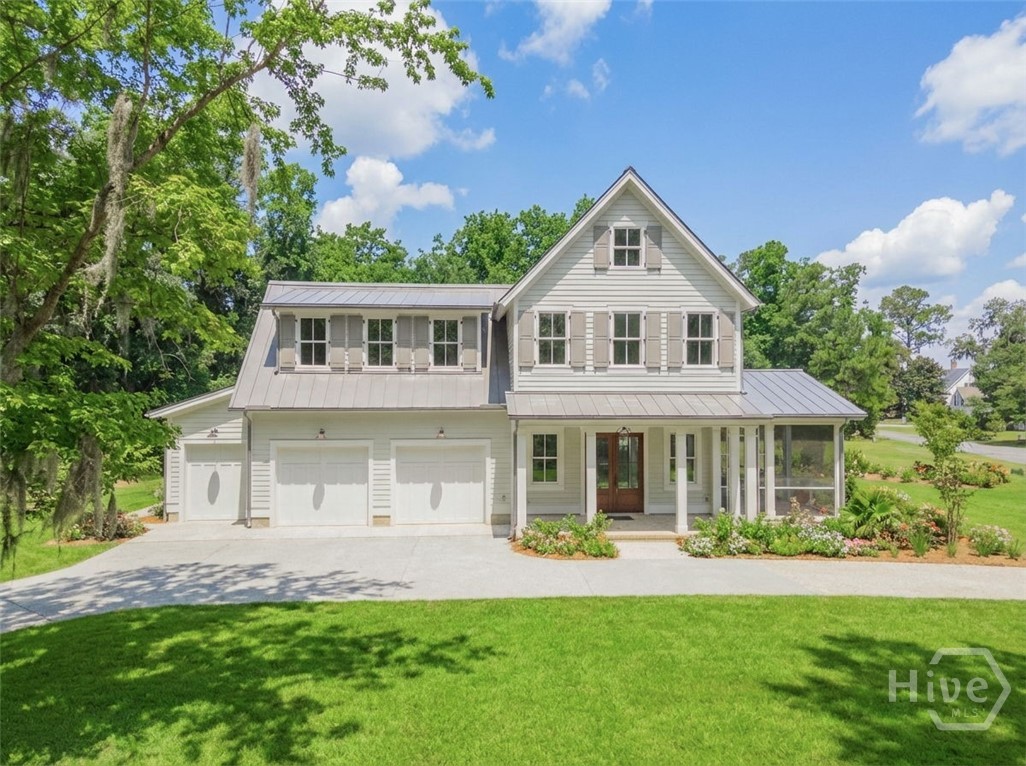 An exceptional Lowcountry retreat in the heart of The Ford Field & River Club, this beautifully crafted 2-bedroom, 2-bath cottage is perfectly positioned on a private 1.21-acre homesite. Enjoy serene views of Lake Clara from the front and the first fairway of the renowned Pete Dye Golf Course from the rear. Thoughtfully designed with 10-foot ceilings throughout, the home features Bosch appliances along with designer-curated tile and plumbing selections that reflect timeless elegance and comfort. Seamless indoor-outdoor living is offered through a spacious 20x20 screened porch, ideal for year-round relaxation or entertaining. The property is completed by a two-car garage plus a separate golf cart garage. Ideally located just steps from the historic marina basin and a short walk to the clubhouse and Lake Dye Grill, this home offers a rare blend of privacy, convenience, and access to world-class amenities.