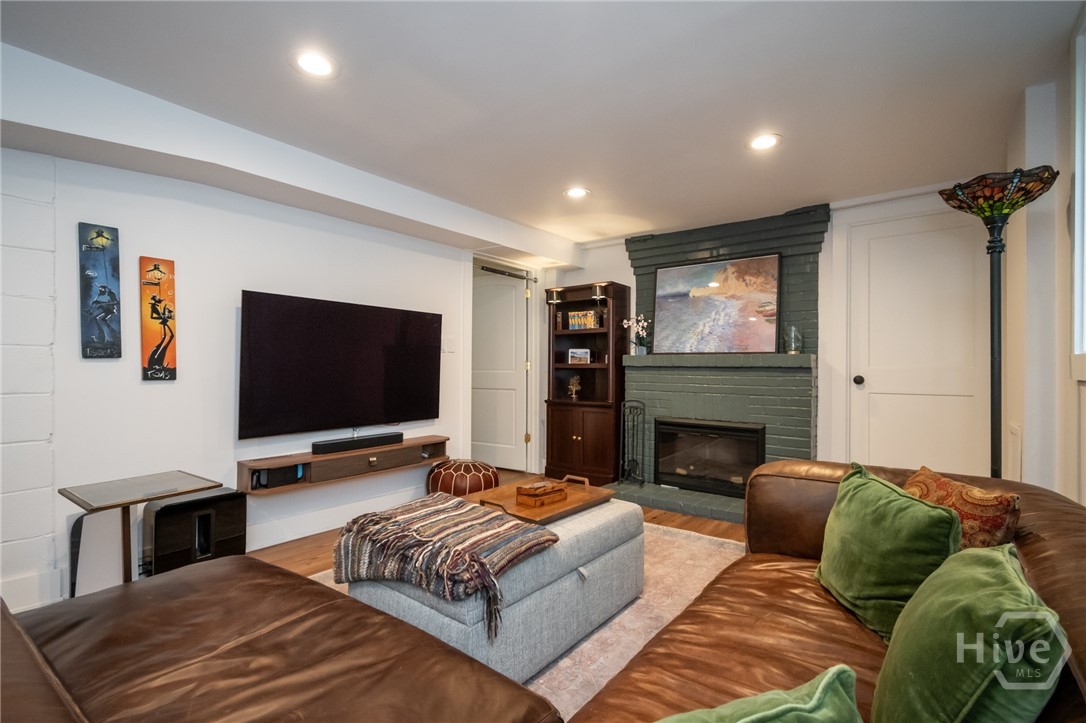 Lower level den with fireplace