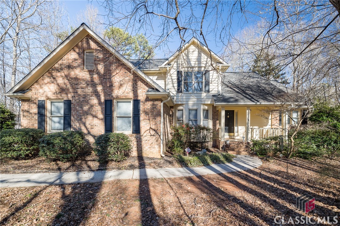 Nestled on a wooded lot in a quiet cul de sac, 1020 Deerbrook feels like a retreat.  The main floor boasts hardwood floors, and the two-story great room is filled with natural light.  The fireplace in the great room sets the stage for a cozy, comfortable place to unwind. The great room opens into the kitchen and breakfast area. The kitchen features ample cabinets and storage and plenty of space for prep work, cooking, and serving. It's big enough for helpers, too! The Owner's Suite is very generous with walk-in closets and a large bathroom with a water closet.  The main floor is completed by a dining room, a half bath, and a laundry room. Upstairs are two bedrooms, each with walk-in closets and a full bath.  Attic storage is very accessible.  The fully finished basement offers a flex room, a large bedroom, and a full bath.  The new deck is perfect for your morning cup of coffee or outdoor gatherings with friends.  Located in the coveted North Oconee School District, 1020 Deerbrook is just what you've been looking for!