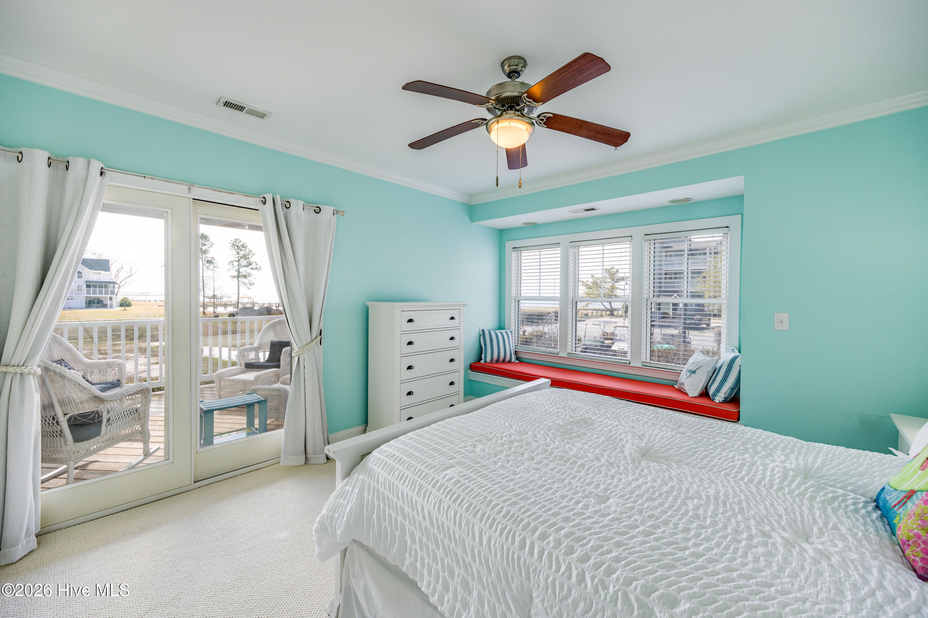 Located under triple windows. Great for storage!