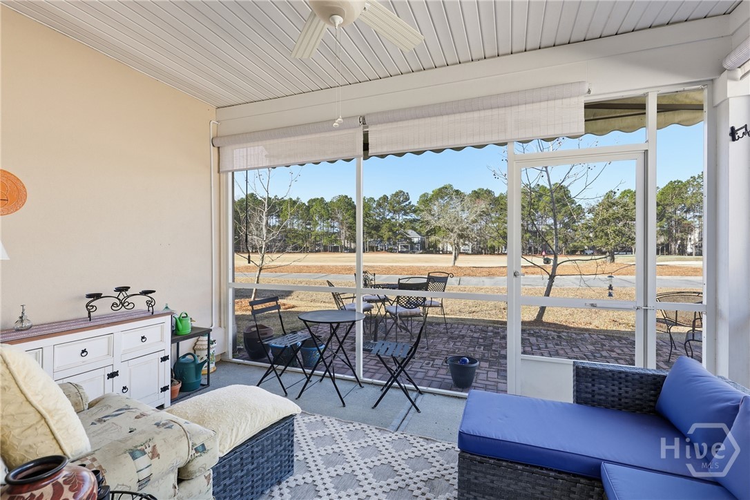 Screened in back porch with golf course view
