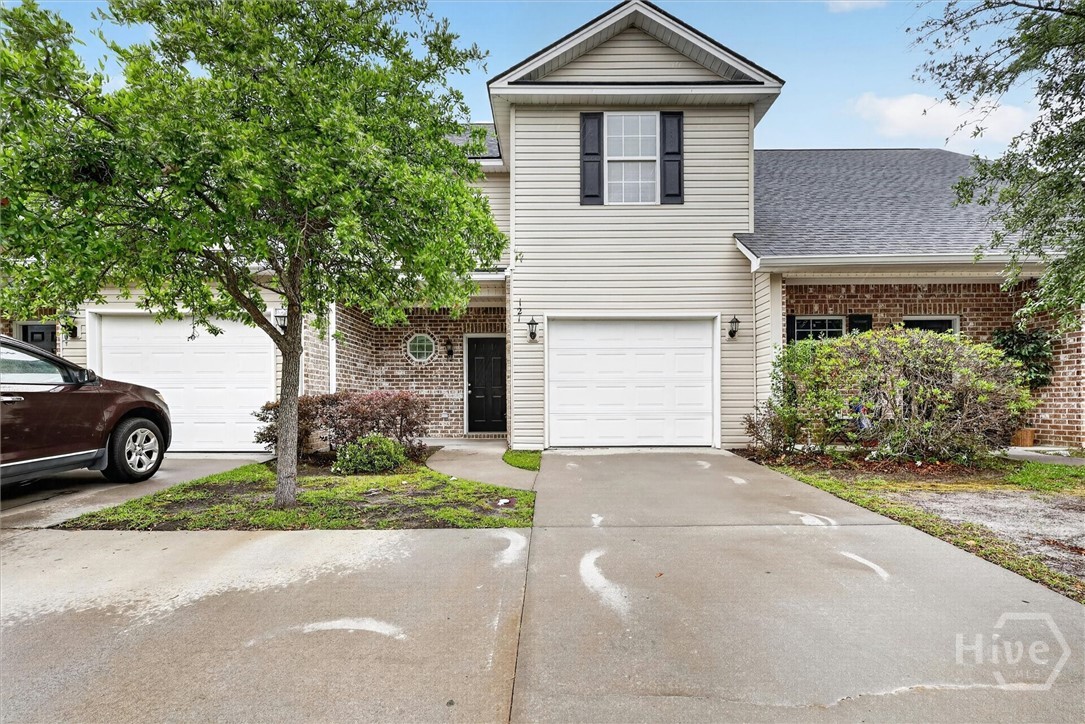Charming 3 bedroom, 2.5 bath townhome in a prime central Rincon location! This inviting home features a welcoming covered front porch and foyer entry, with fresh paint and brand-new carpet throughout. The spacious living room flows into the dining area showcasing elegant wainscoting and a tray ceiling, while the breakfast bar overlooks the kitchen complete with black appliances. A convenient half bath is located downstairs, with the laundry room upstairs near all bedrooms. The primary suite offers a tray ceiling and walk-in closet, and you’ll love relaxing on the covered back porch!