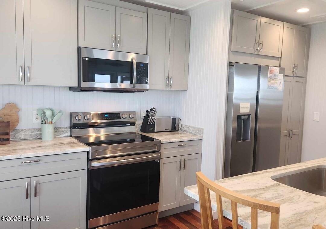 Newly renovated kitchen with all new appliances, granite counters, soft close cabinets, pantry, and more!