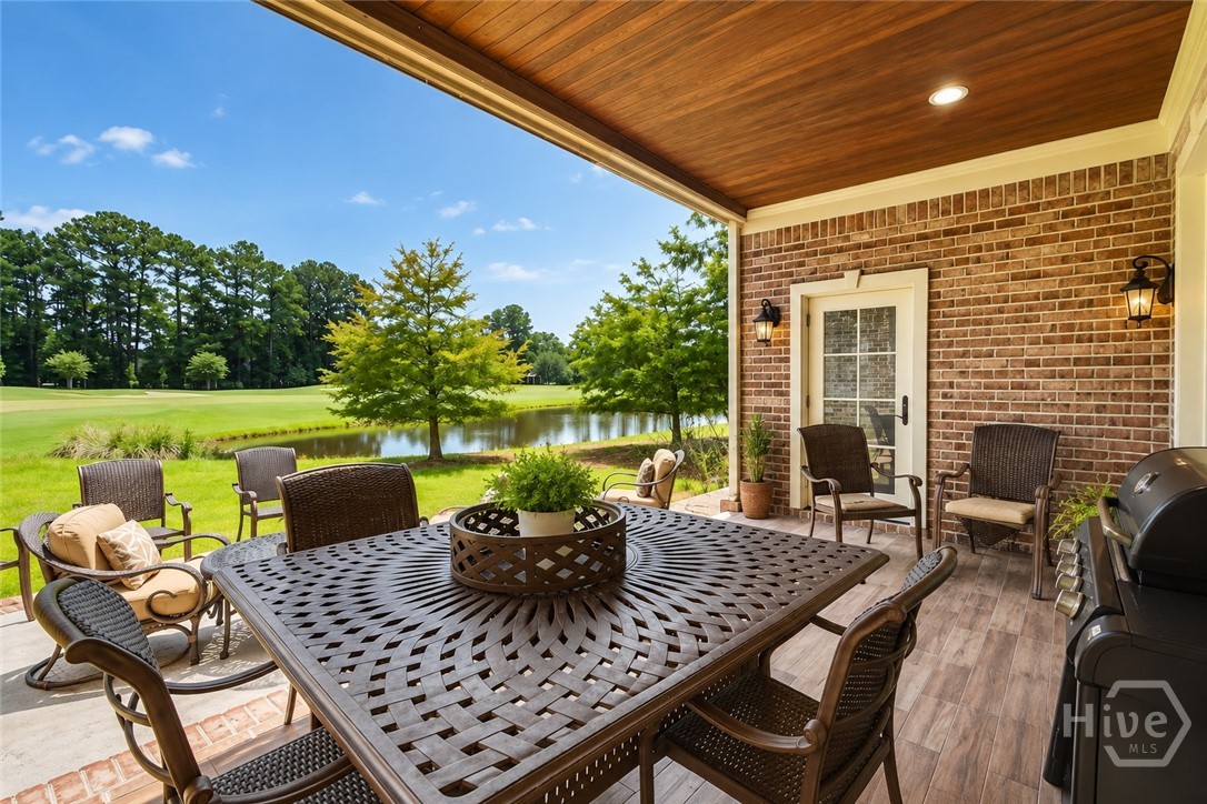 First floor covered patio looking at golf course